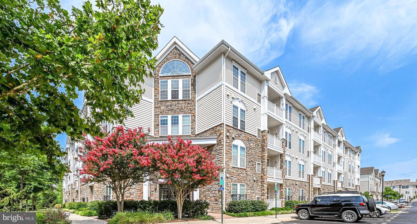 Welcome to this beautifully updated condo in the heart of Aldie! The spacious and well-maintained garden level home features a host of recent upgrades, making it truly move-in ready.
Step inside to the open layout, complemented by modern fixtures that add a clean, contemporary feel. Enjoy an upgraded kitchen, equipped with new stainless steel appliances, including refrigerator, range, microwave, washer, and dryer. Two generously sized primary bedrooms with ensuite baths (one featuring a walk-in, seated tub). 
Walk outside and enjoy the quiet first-floor unit’s access to the outdoor mezzanine, which adds convenience and accessibility. 
Additional highlights include two dedicated parking spaces in a secure underground garage, a rare and significant advantage to the condo, as well as a private storage unit for extra space.
Located in a desirable community with easy access to shopping, dining, and major commuter routes, this home combines comfort, style, and practicality.
Don’t miss the opportunity to own a thoughtfully upgraded home in a prime location!