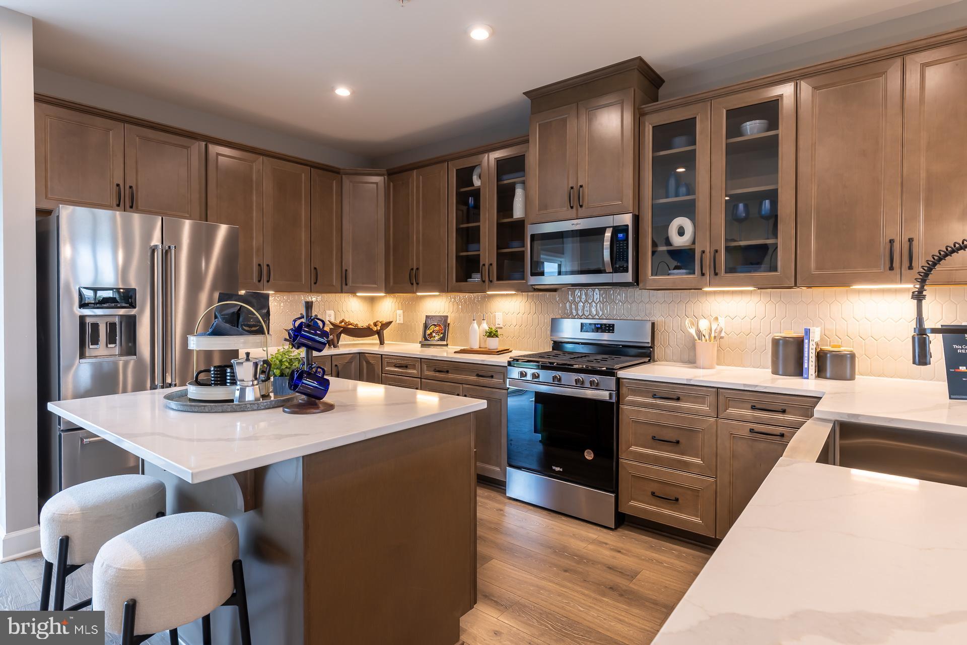 The Potomac model offers spacious and flexible living across three stories, with an optional fourth-story loft and deck for even more room to grow and entertain. This thoughtfully designed townhome features 3 to 4 bedrooms, including a bright and open primary suite on the bedroom level, complete with a conveniently located laundry area. Two generously sized secondary bedrooms provide space for family and guests with a full-size bathroom. On the main living level, you'll find an impressive open-concept kitchen that seamlessly connects the great room and dining area—ideal for everyday living and effortless entertaining. The attached 1-car garage opens to a recreation room or 4th bedroom with full bathroom. As a homeowner, enjoy community amenities, including the dog park, community playground, pickleball and tennis court, and community gardens. Plus, enjoy access to Sparrows Point Country Club, which includes a marina, boat ramp, newly renovated clubhouse with restaurant & bar, an 18-hole championship-style course on Bear Creek, and the 2nd largest pool in Baltimore County. See your brand-new home today. Enjoy energy savings with our ENERGY STAR® certified and Indoor airPLUS-qualified homes. *Photos are of the Model home. *This listing reflects the base price for a to-be-built home on a lot in the community. *Pricing, features, and availability subject to change without notice.