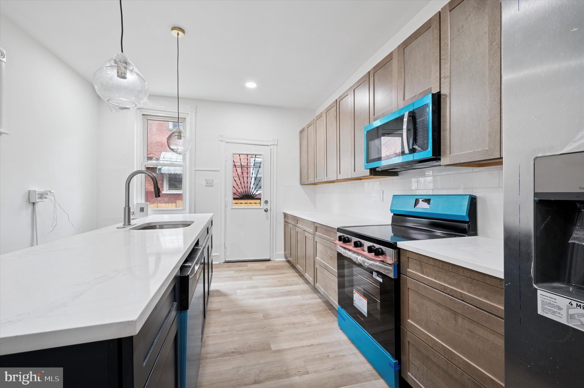 Welcome to 5457 Cedar Avenue – a beautifully renovated 3-story home offering the perfect blend of modern finishes and timeless character. With 5 spacious bedrooms, 3 full bathrooms, and 2 half baths, this 2,100 sq ft property has been thoughtfully designed for comfort and style.

Step inside to find luxury vinyl plank (LVP) flooring flowing throughout the home, providing durability and elegance in every room. The heart of the home is the stunning, brand-new kitchen featuring quartz countertops, stainless steel appliances, custom cabinetry, and a sleek tile backsplash – perfect for both everyday living and entertaining. The open-concept layout offers generous living and dining spaces filled with natural light, while the upper levels include well-sized bedrooms and beautifully updated bathrooms with contemporary fixtures and finishes. Conveniently located near public transportation, universities, and Clark Park, this home is a rare find in one of Philadelphia’s most vibrant neighborhoods.

This address also qualifies for Wells Fargo’s $10,000 Homebuyer Access Grant which could help the current owner if they are looking for a new home or help the buyers who are purchasing this home. We also have a $5,000 closing cost credit program called Dream Plan Home and a complimenting mortgage program that only requires 3% down at a competitive interest rate and discounted PMI. All three of these programs can be layered with most Down Payment Assistance programs in Philadelphia and across Pennsylvania, New Jersey and Delaware.

Please inquire for inspection report.