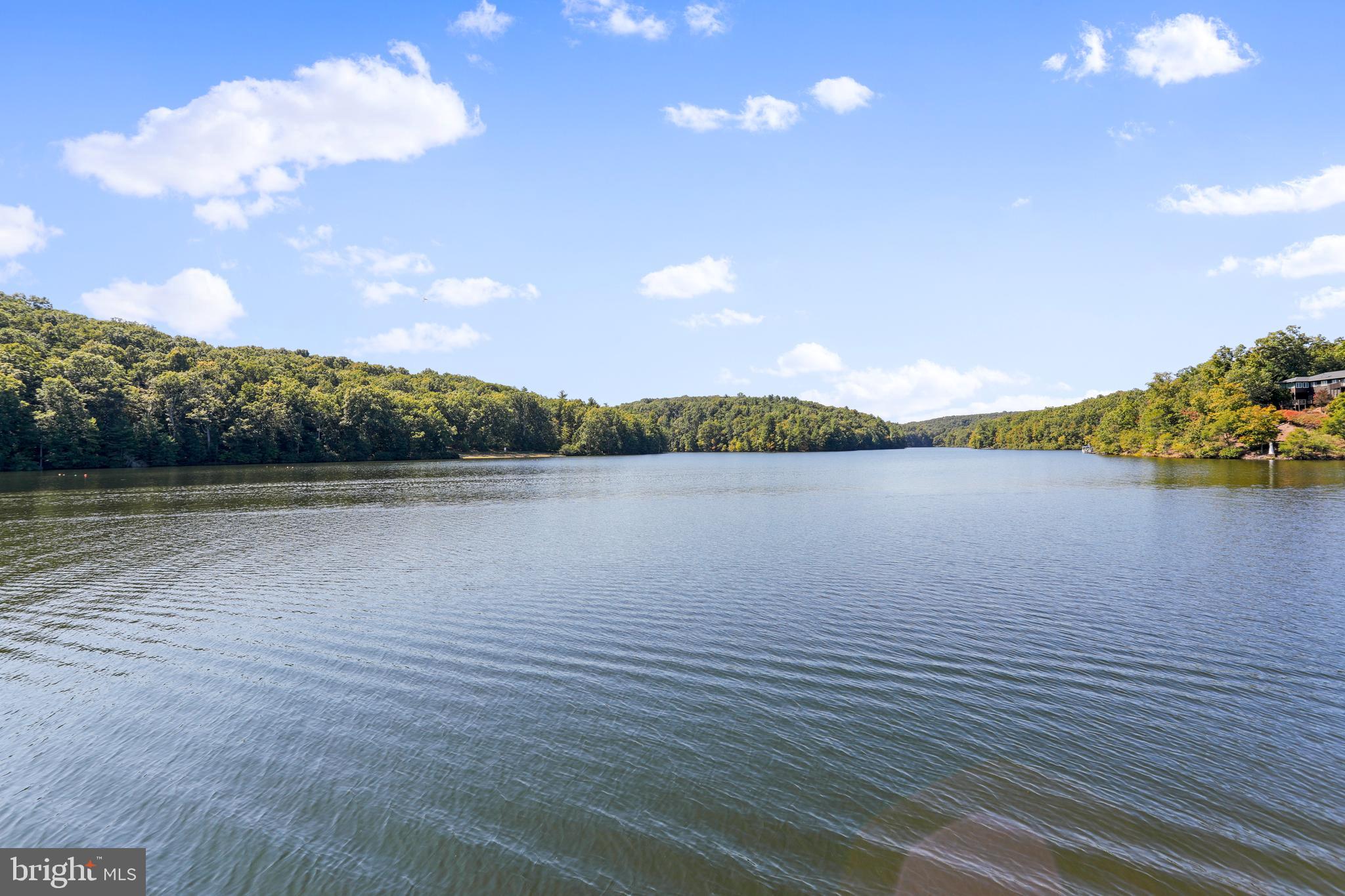 Escape to the Lake!
This is your opportunity to own a membership lot in the beautiful, 240-acre gated community of Lake Holiday, just 20 minutes from Winchester.

Ownership grants you full access to the community’s outstanding amenities, including a deep-water lake perfect for boating, fishing, swimming, and water skiing. Spend your days relaxing on one of two sandy beaches or take advantage of the marina with dock slip rentals, clubhouse with fitness room, fishing pier, walking trails, dog park, playgrounds, and courts for tennis, basketball, and volleyball.

Whether you're looking for a weekend escape, recreational access, or a way to enjoy the Lake Holiday lifestyle, this lot offers an affordable way to become part of this vibrant lakefront community.