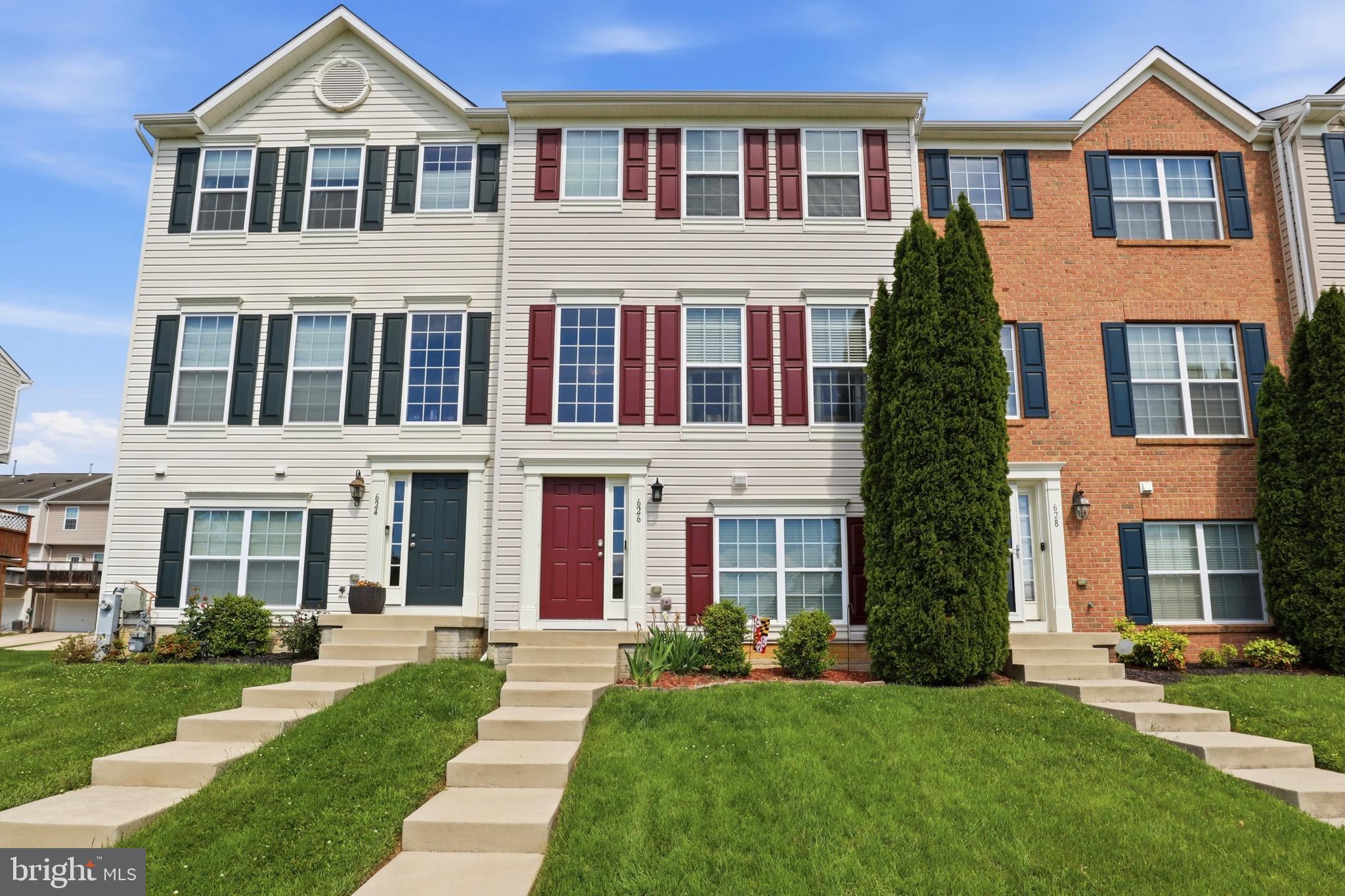 Beautifully maintained townhouse offering the perfect blend of comfort, style and functionality! This move-in ready home features 4 bedrooms, 2.5 baths and a 2-car garage with thoughtful upgrades throughout. Filled with natural light and high ceilings, the home offers an inviting layout designed for everyday living and entertaining.

The spacious primary suite serves as a relaxing retreat with multiple walk-in closets, including “his & hers” closets, and a luxurious private bath featuring a double vanity, tile soaking tub, walk-in tiled shower and elegant finishes. Two additional upper-level bedrooms share a full hall bath with tub/shower combo. The lower level includes a 4th bedroom or flexible bonus space ideal for guests, home office, gym, or playroom, with plumbing already in place for a potential 3rd full bath.

The main level showcases an inviting living room with crown molding and a beautifully appointed kitchen complete with stainless steel appliances, granite countertops, pantry storage, hardwood flooring and slider access to the rear deck overlooking the backyard. Hardwood flooring extends through the foyer and powder room, while comfortable carpeting enhances the remaining living spaces.

Additional updates and features include a new AC/HVAC system, new hot water heater, garbage disposal, sprinkler system and ample storage throughout. Enjoy sidewalks for walking or jogging and a playground directly across the street. Conveniently located and low-maintenance, this home combines modern updates with stylish finishes and everyday comfort.