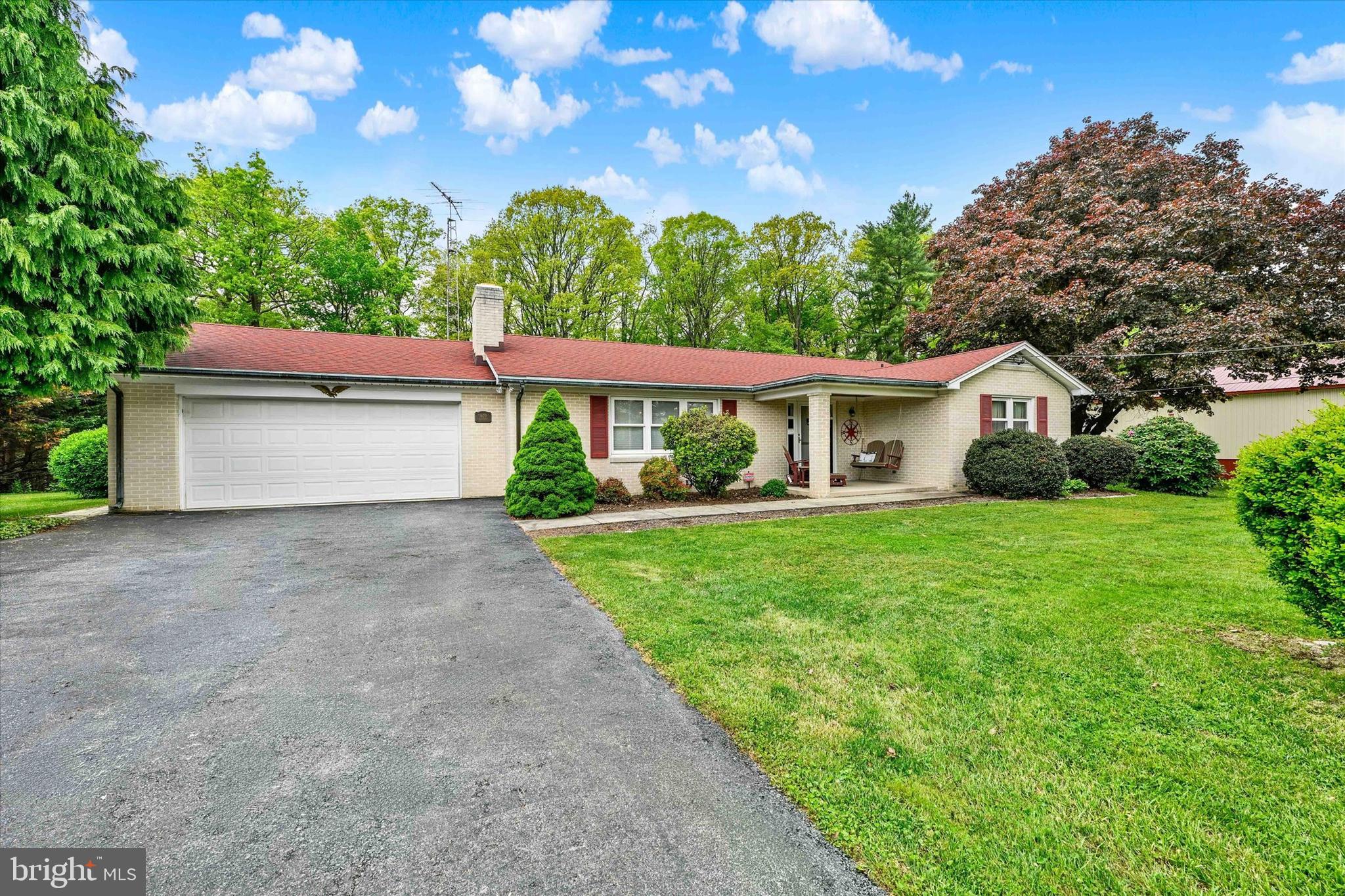PRICE REDUCTION!!  Welcome to 1609 Fairmount Rd—a property that offers so much more than just a place to call home. Nestled on a serene 1.59 acre lot in a quiet Hampstead neighborhood, this meticulously maintained rancher delivers modern updates, effortless charm, and one standout feature you won’t want to miss.

Let’s talk about the showstopper: the 40x60 Pioneer Pole Building. Built in 2017, this extraordinary structure is a dream come true for car enthusiasts, mechanics, or anyone who needs serious workspace or storage. It features a massive 14x14 raised panel door with a LiftMaster opener, a reinforced 6-inch concrete floor, 100-amp sub-panel electric service, and a 50-amp RV receptacle. And here’s the kicker—the lift in the pole building conveys! Whether you’re restoring classic cars, working on custom builds, or simply tinkering with your collection, this space is ready to fuel your passion.

But that’s not all the property has to offer. With a 2-car attached garage and an additional 2-car detached garage, there’s no shortage of space for your vehicles, tools, or hobbies.

The home itself is just as impressive, with thoughtful updates that make life both stylish and convenient. The kitchen shines with Cambria Quartz countertops, a ceramic tile backsplash, and high-end stainless steel appliances from LG and KitchenAid. Major systems have been upgraded too, with a new roof in 2015, a 200-amp electric service, and all plumbing updated in 2017.Living room addition with full laundry room on the 1st floor!  Outside, the backyard patio and hot tub area is enclosed by a sleek black aluminum fence. Perfect for pets or added privacy.

On top of all this, the location is ideal! Minute's from route 30, easy access with 795, close proximity to Baltimore. Being only a few steps from all the town of Hampstead has to offer, but with privacy and quiet living really makes this property unique!

This property is the complete package: a comfortable home, a private setting, and a fully equipped pole building that’s ready to support your passions or profession. Don’t wait—schedule your showing and see it for yourself!