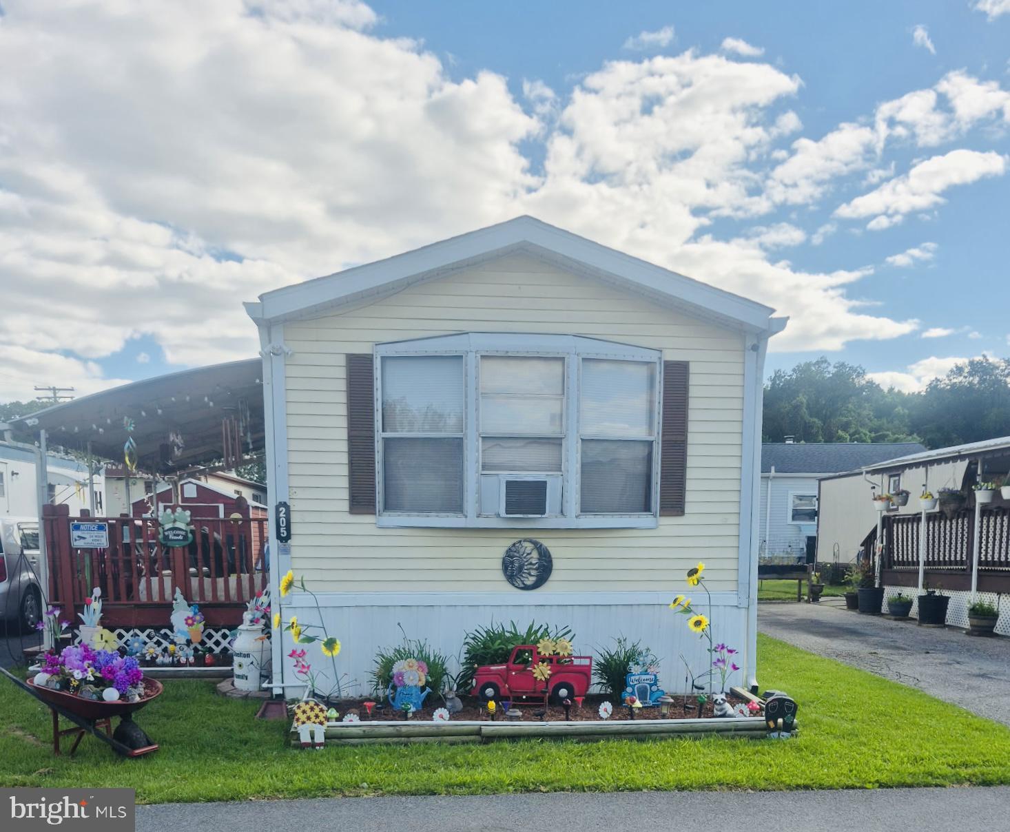 Charming and well-maintained 2-bedroom manufactured home in Dundalk offering easy single-level living. Step inside to find a comfortable, move-in ready layout with central A/C, thoughtful accessibility features including wide doors and lever handles, and a fun Lego-themed bedroom that brings character and personality to the home. Off-street parking, public utilities, and a convenient location near Sparrows Point schools and major commuter routes make this a great fit for first-time buyers, downsizers, or anyone looking for low-maintenance living. Offered at $50,000 with ground rent in place — a rare opportunity at this price point.