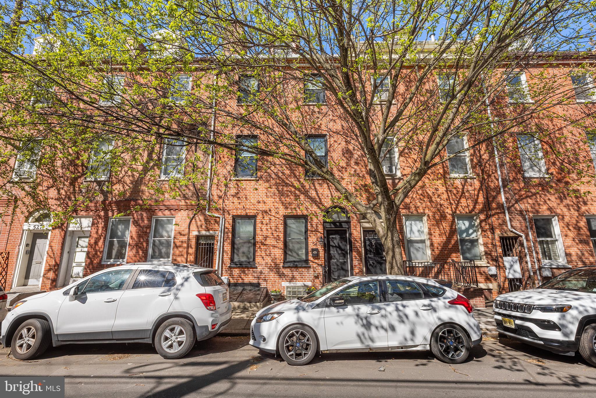 Step into a rare piece of Philadelphia history at 523 Fairmount Avenue, an exceptional 19th‑century residence built as part of the estate of Stephen Girard—one of the city’s most influential figures and the wealthiest man in America at that time. Set in the heart of Northern Liberties, this home offers a scale, level of renovation, and historic pedigree that are nearly impossible to find at this price point in such a premier location. The original brick façade exudes timeless curb appeal, while inside, the home seamlessly blends preserved architectural character with modern comfort. Five spacious bedrooms, three full baths (including a serene primary suite with soaking tub), and two half baths are spread across four grand floors. High ceilings, rich wood floors, custom millwork, and thoughtfully restored details create an atmosphere that is both warm and sophisticated. A true standout is the expansive rear yard—a lush, private urban retreat rarely found in this neighborhood. Multiple outdoor spaces invite relaxation, gardening, and entertaining. The full finished basement adds even more versatility, perfect for a home gym, media room, office, or playroom.
Just steps from acclaimed dining, boutiques, and cultural destinations, this home sits in a neighborhood shaped by William Penn’s original vision and celebrated today for its vibrant energy and architectural charm. 523 Fairmount Avenue is a unique opportunity to own a beautifully restored piece of Philadelphia’s past while enjoying the best of modern city living.