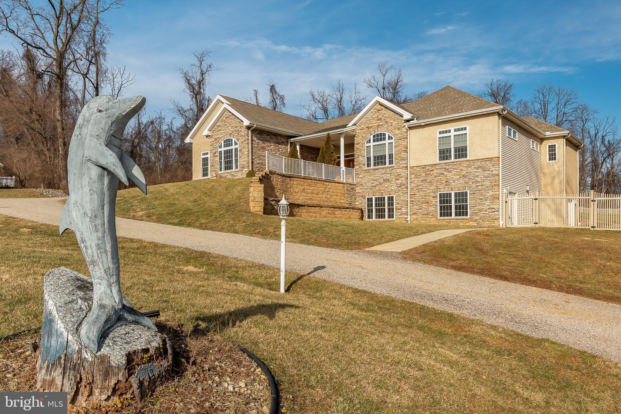 The one you have been waiting for is finally here! This amazing one story ranch home is bursting with everything for comfortable living. Welcome home to 385 Windsor Road. The large foyer will welcome you to an open floor plan you will quickly fall in love with upon viewing. This home was built with numerous ADA requirements. The primary bedroom and bathroom are both equipped with a ceiling lift track system. The primary bathroom offers an oversized roll in shower. The elevator, just off of the foyer, provides easy access to the lower level family room which is also equipped with the ceiling lift track system. Accessible light switches and door handles are equipped throughout the house. The indoor in-ground swimming pool and hot tub also comes equipped with the ceiling lift track system. An additional roll in shower and ceiling lift track system can also be found in the full bath off of the in-ground pool area. The lower level provides added living space with two additional bedrooms and two additional full baths. This is one you really have to see and take advantage of today. Don't let this one slip by you.