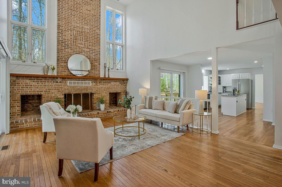 Some homes make you pause at the door. This is one of them. ||

Renovated in 2025, this custom built home is Set on 5+ wooded acres offering privacy, presence, and over 6,000 sq ft of beautifully updated living space.
 4 bedroom, 3.5 bath estate features a soaring two story foyer, dramatic staircase, cathedral ceilings, hardwood floors, and a light filled great room designed for everyday comfort and entertaining. ||

The flexible layout includes a main level in law suite with full bath, a dedicated home office with wooded views, multiple living areas, and three fireplaces throughout. Upstairs, the owner’s suite feels like a private retreat with its own fireplace, spa bath, generous proportions, and elevated views of the surrounding tree line. ||

The finished walkout basement adds even more room to live, gather, and unwind with flexible space, a built in sauna!!!, and direct access to the lower patio. Outside, the rear deck, patio, and mature woods create the kind of quiet privacy buyers hope to find but rarely do. ||

Close to shopping, dining, entertainment, hospital access, and approximately 25 miles to NAS Patuxent River via MD 4, this home delivers space, privacy, and convenience in one unforgettable setting.