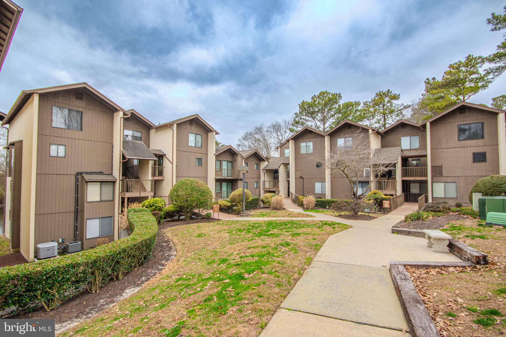 This 2 bedroom 2 bath condo in Canal Woods could be a charming primary residence, 2nd home or investment property.  Conveniently located near SU, Tidal Health, shopping, restaurants and all things in the Salisbury/Fruitland area, this unit is affordable and has been well maintained.  There are water views of Tony Tank pond from the bedrooms and a private balcony. The foyer and balcony have addition closets for storage. Electric bills avg. $130  monthly.  Qualifies for USDA, no money down financing.