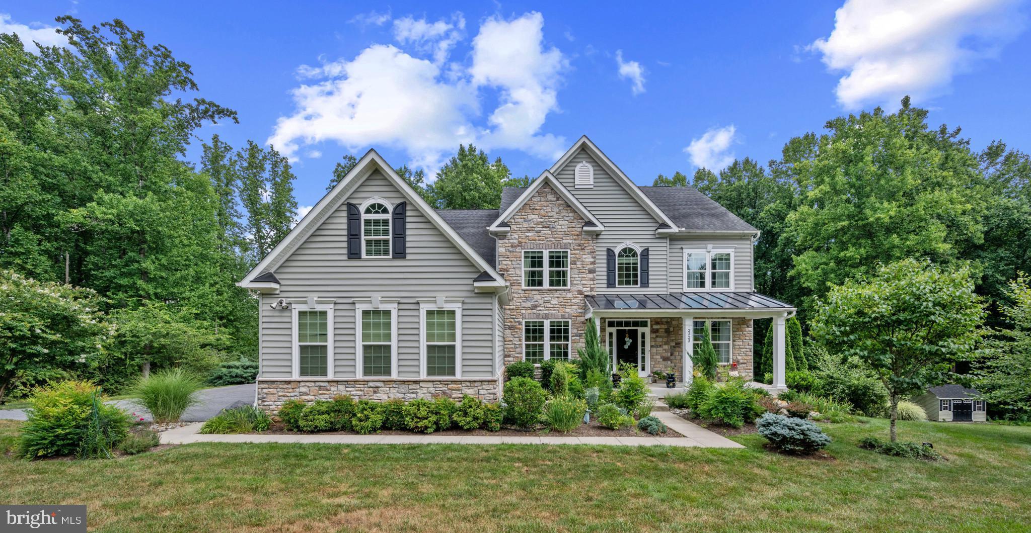 Welcome to this exquisite home in the Estates at Liberty Reservoir. This highly sought-after  luxury community that perfectly balances countryside tranquility with modern conveniences, in a peaceful environment.  

Only 10 years young, this 5 bedroom (one on the main floor), 4.5 baths, 3 car garage checks all the boxes.  The open flow of the main floor has an incredible kitchen designed to practice your culinary skills 5 burner gas cook top, double wall oven and  on the center island, which adjoins the 2 story family room with fireplace and coffered ceilings.  The stunning view from the family room is complimented by the wrap around deck, that also allows for cover over the spacious patio with fire pit. There is even a small basketball paver court for a little competitive practice. 

The upstairs has a Jack & Jill Bath with individual sinks adjoining both bedrooms, plus another spacious bedroom with an en suite bath and walk in closet. The "Piece De Resistance" is the primary suite! An expansive and serene bedroom with ample space for a sitting area to relax and unwind, is complimented by the spacious bath with 2 vanity sink areas, a walk in shower for 2, private lavatory area, and an almost endless closet area with built ins. Both the main floor and upper floors have no carpet with can be a great feature for people with allergies.

The lower level was made for your entertaining!  A spacious family room with a pool table that will convey.  has a large built in bar area, with sink, beverage fridge, and dishwasher.  Also an individual office space and full bath.  This fun filled space leads to the peaceful back yard with patio and built in firepit to enjoy well into the Fall, all while enjoying natures beautiful view and the music made by the melodic variety of birds.

Situated on a peaceful lot,  in this home you would  live directly adjacent to the breathtaking 9,200-acre Liberty Reservoir and Cooperative Wildlife Management Area, offering year-round hiking, horseback riding, bird watching, rowing, and photography. 

While this home feels like a quiet rural retreat, you are just minutes away from the vibrant shopping, dining, of award winning  Eldersburg/Sykesville.  Eldersburg offers quick, convenient highway access to major employment hubs in Baltimore, Frederick, and Washington, D.C. Many commuters to NSA, Ft. Meade, Johns Hopkins & DC. 

Are you ready to enjoy this serene estate living? Call Nancy & Eric Horne today for private tour.