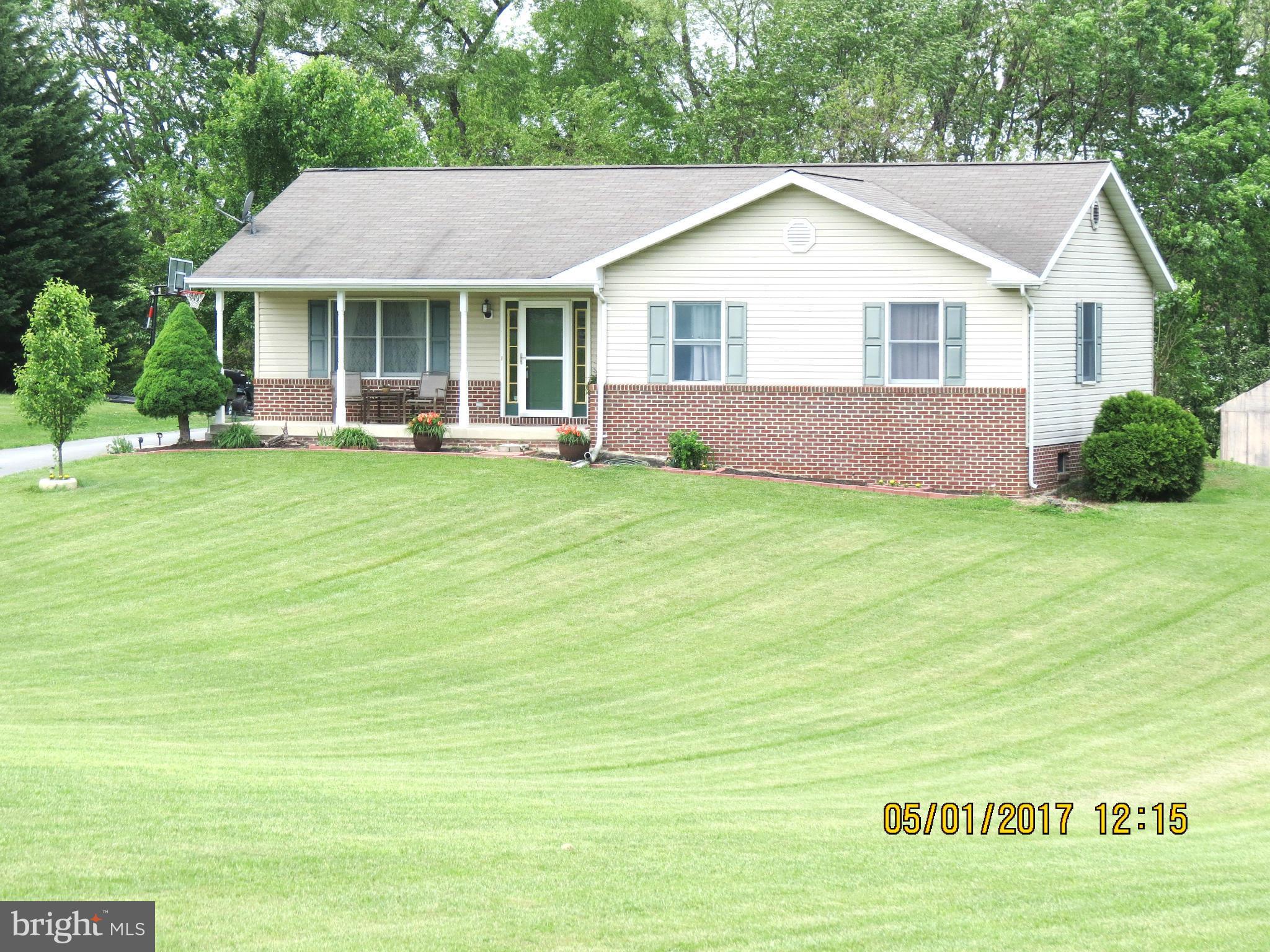 Cute rancher with full basement partially finished on approx. almost 2 acres (+/-). Recreation room in the basement plus an extra room. Brand new heat pump unit.  New carpet in BRs and new laminated hardwood floor in the living room. Located in a great commuter location! Close to MD line, Hagerstown and Potomac River. Only minutes from  I-81, Rt.11 and Rt.70.