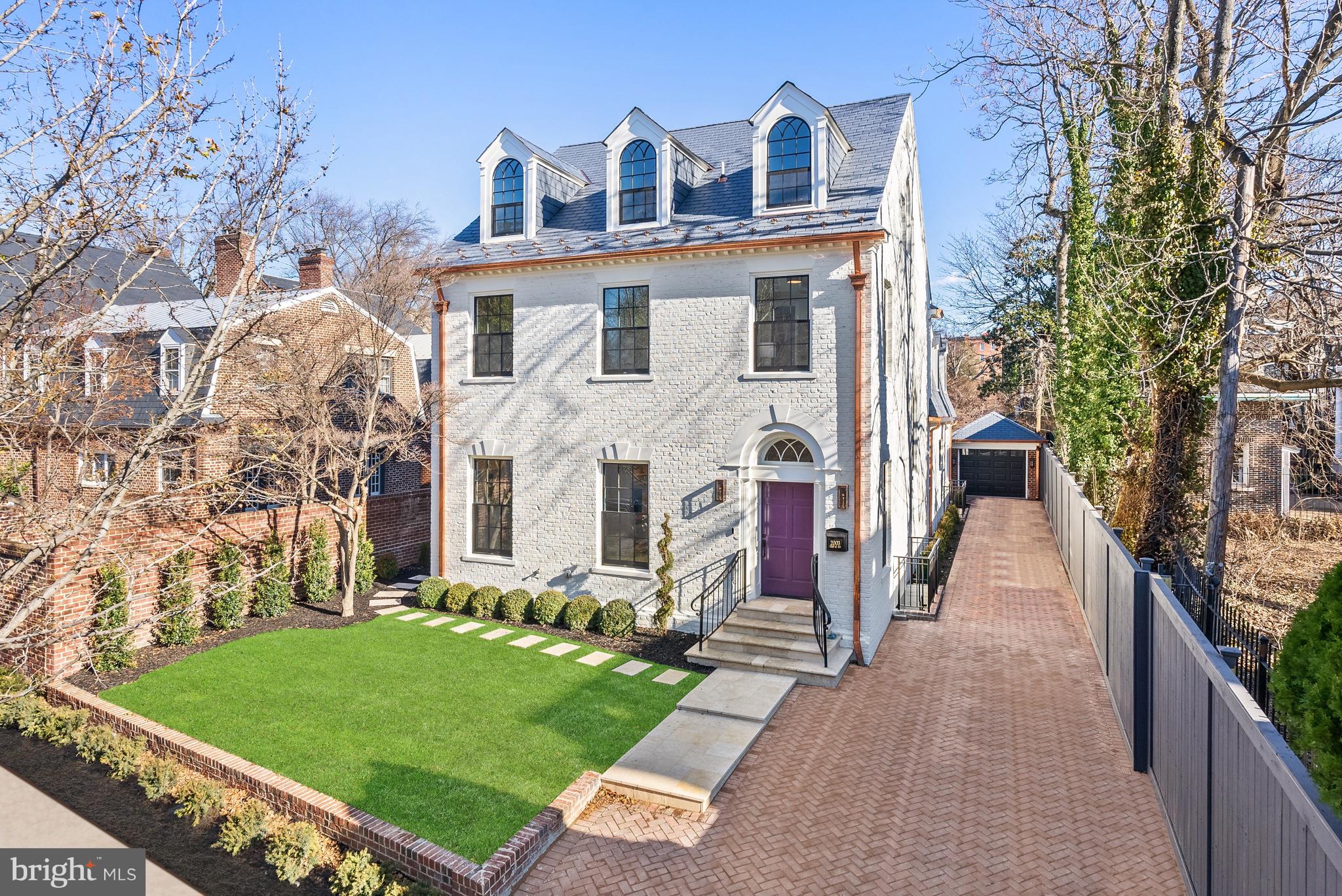 Dilan Homes has completed a top-to-bottom reimagination and restoration of this gorgeous Federal-Inspired Brick Home. Marble checkerboard floors; brass adorned grand staircase; multiple sets of 8 foot tall elegant French Doors leading to extensive hardscape terraces and gardens; luxurious marble bathrooms; stunning primary and guest suites; multi-piece trimwork; and stately room sizes with soaring ceiling heights are throughout this sophisticated Kalorama facade. 7200 total SF residence with over 50 feet of street frontage, gardens lined in brick walls, brick garage, and long 10' wide driveway for multiple cars create a mini estate-like presence for this in-town property. 5 Bedroom Suites and Powder Room.