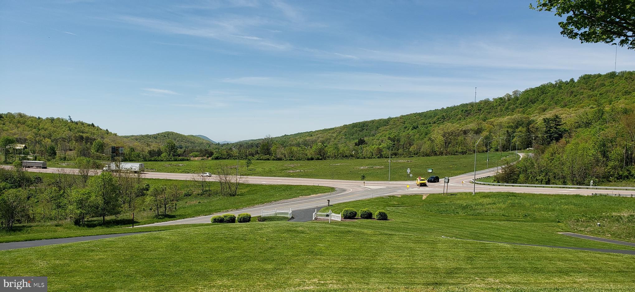 Development Opportunity!
Two lots totaling 9 acres in with high visibility crossroads and approved entry with full subdivision site plan, over 1,400 of street frontage, borders US 220 north/south highway, convenient access to I-68, Love's Travel  Center, Rocky Gap Resort, will lease & build to suit considered.
