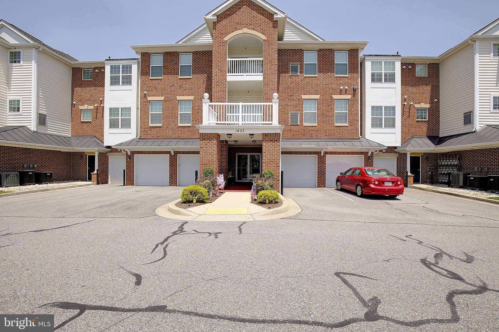Welcome to this stunning penthouse condominium in the highly desirable 55+ community of Carroll's Creek. Offering approximately 1,300 square feet of beautifully appointed living space, this two-bedroom, two-bath residence combines comfort, style, and convenience in a secure elevator building with a private one-car garage.

The thoughtfully designed floor plan features 9-foot ceilings and genuine hardwood flooring throughout the condominium, creating an open and elegant atmosphere. The upgraded kitchen is appointed with rich cherry cabinetry, granite countertops, and a premium lighting package, while the upgraded bathrooms add a touch of luxury. Additional enhancements include upgraded light fixtures throughout, highlighted by an elegant dining room chandelier and stylish kitchen lighting. A conveniently located laundry area with a full-size washer and dryer adds to the home's practicality and ease of living.

Enjoy your morning coffee or unwind in the evening on the private balcony overlooking the community. Carroll's Creek residents enjoy exceptional amenities, including a clubhouse and outdoor pool, providing the perfect setting to stay active and socialize with neighbors.

Ideally located with convenient access to Baltimore, Annapolis, and Washington, D.C., this exceptional penthouse offers low-maintenance living in one of the area's most sought-after active adult communities.

The lockbox is on the bench by the building’s entrance. Use the key fob to enter by holding it up to the black box on the phone system. The garage door is number 11 on the main level to gain access to the one-car garage.