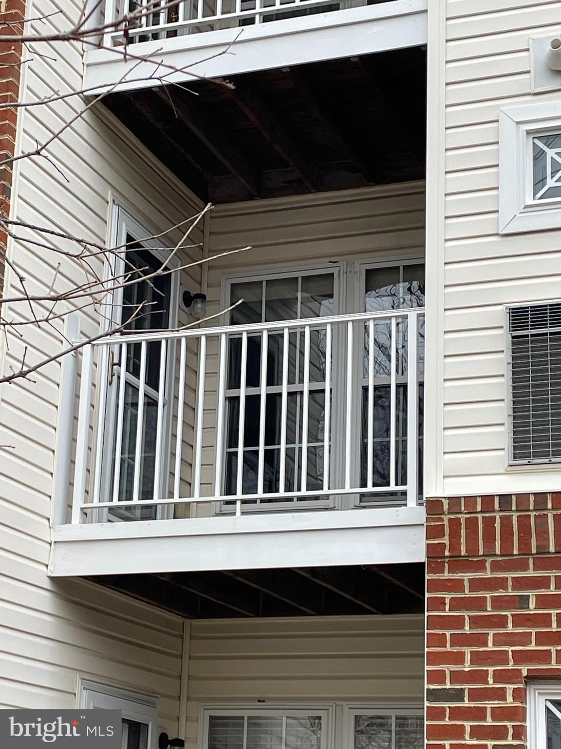 Nestled in the woods of White Marsh, this second floor two bedroom two full bathroom condominium in the quiet Silver Lake Community is just waiting for you.  The unit is on the second floor of a secure elevator building.  It has an open concept. The living and dining area are bathed in natural light from oversized  windows, that provide a versatile space for both relaxation and entertainment. Enjoy your morning coffee or evening wine on a private balcony.  Silver Lake is minutes from the Whitemarsh shopping district and Honeygo  Run Regional Park which features nature trails, a dog park, paved walking paths and outdoor pickle ball courts. It also has easy access to Interstate 95. The owner's are providing a $10,000.00 buyer's credit that can be used to replace the worn carpet, outdated paint color and other minor repairs. You can bring your own style and taste to your new home. Or use for closing costs.