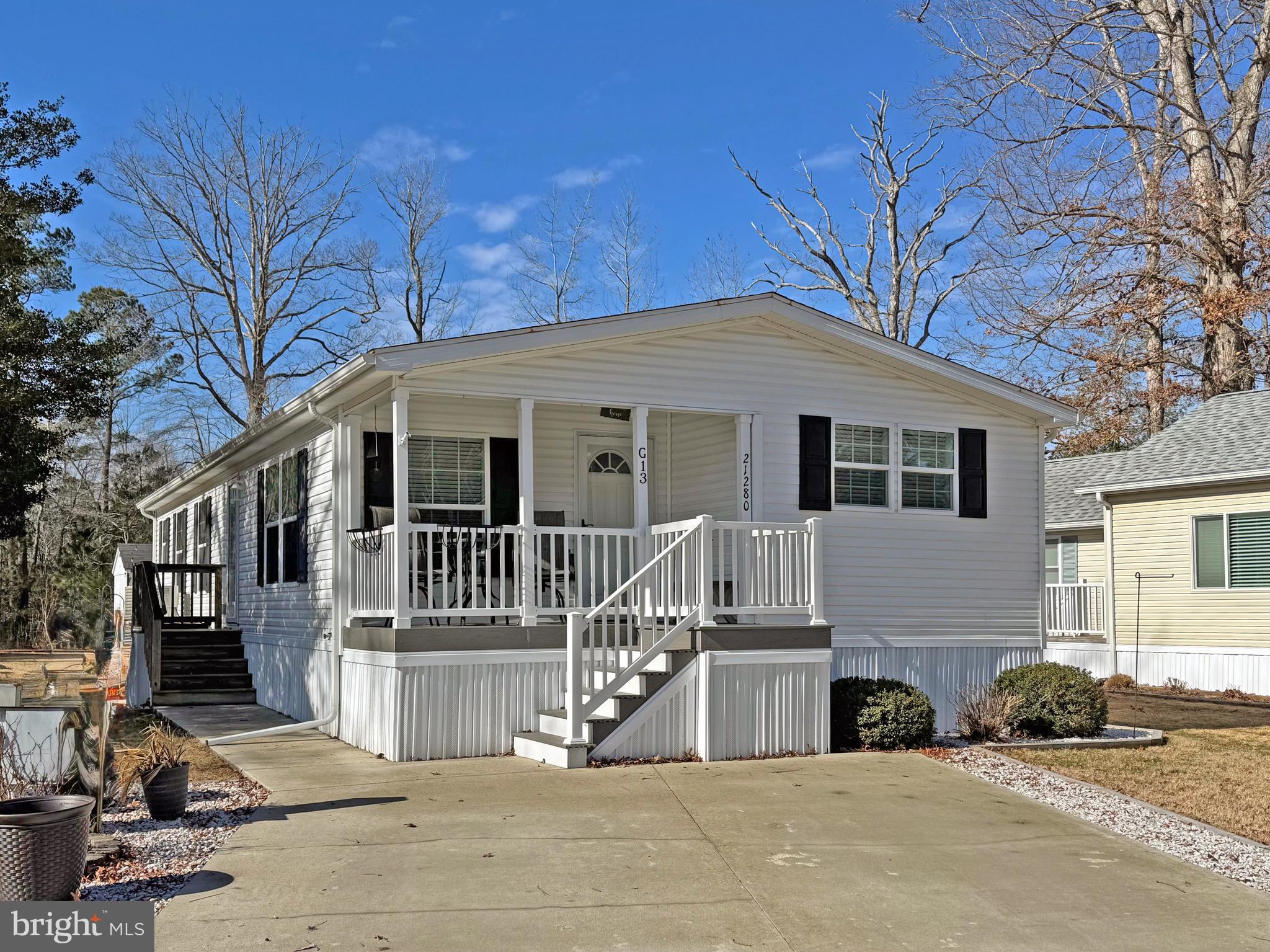 Pond views from your backyard! Fully furnished...and includes a🚗 Golf Cart 🚙  Rehoboth Bay Community has boat slips for rent, a community boat ramp, a boat storage area, a bayfront pool, a crabbing/fishing pier, a little sandy beach, tennis/pickleball courts & more!  And it is just 6.5 miles to the famous Rehoboth boardwalk. This 2017 Skyline features vaulted ceilings, drywall, and crown moulding accents. Open concept floor plan. The living room opens to the dining area, which adjoins the kitchen. The kitchen has a center island and stainless steel appliances. The appliances include, a fridge, smooth-top electric range, built-in microwave, and a dishwasher. There is a second full-size fridge in the laundry room, too. The main bedroom is en Suite. That bath has a stall shower with seats, a double-sink vanity, and a linen closet. The other two bedrooms share the second full bath in the hall, which has a tub/shower. The patio area next to shed is a great place for your barbeque grill and it offers great views of the pond. The shed has electric to charge the golf cart. The community allows 2 pets (no fences, though).  Leasehold Interest: Lot Rent of approx. $758.88/mt. includes water service & trash/recycle. (Delaware law caps rent increases as per 25 Del. C. Sec 7050-7054 with Lease renewals on Jan. 1). Homeowner pays electric, sewer, LP gas, cable/Internet, and lawn maintenance.  Hometown America, the community owner, requires an Application from the Buyer (and all adult occupants 18-year-of-age or older), with acceptance based on the following criteria: 1.)income verification, 2.)credit bureau score, plus evaluation of debt-to-income ratio, and 3.)criminal background check. (Note: Family & friends may always visit, but rentals are NOT permitted in this community.) Financing may be available to qualified borrowers from only a very few Lenders who specialize in installment/chattel loans for manufactured homes on leased land. Closing costs will include a real estate transfer tax (3.75% DMV Doc Fee) & a Settlement Agent fee.