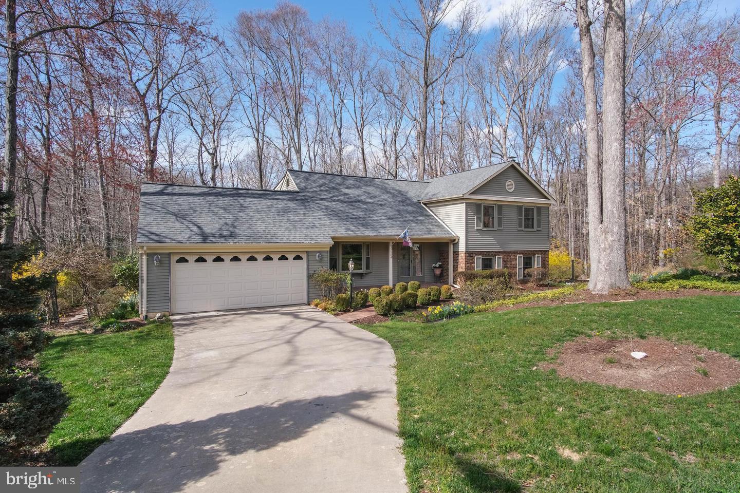 This professionally managed, generously sized four-bedroom home in Lake Ridge offers a tranquil living experience. A welcoming hardwood foyer leads to formal living and dining areas, while an eat-in kitchen provides a comfortable gathering space. A bright den with a fireplace adds warmth, and three bedrooms, including an en suite, are located on the mid-level. The top level features a private primary suite with a full bath, double closets, and ample storage. The property's charm extends outdoors, with a quiet cul-de-sac location backing to mature woods, providing a peaceful natural backdrop. A screened-in back porch offers sublime serenity, and a convenient oversized two-car garage completes this inviting home.-------------------------------------------------------------------------------------------------------------------------------------------- All Richey Property Management residents must enroll in and purchase a Resident Benefits Package which includes liability insurance, credit building to help boost the resident’s credit score with timely rent payments, up to $1M Identity Theft Protection, HVAC air filter delivery (for applicable properties), move-in concierge service making utility connection and home service setup a breeze during your move-in, our best-in-class resident rewards program, and much more! More details and options provided upon application.
