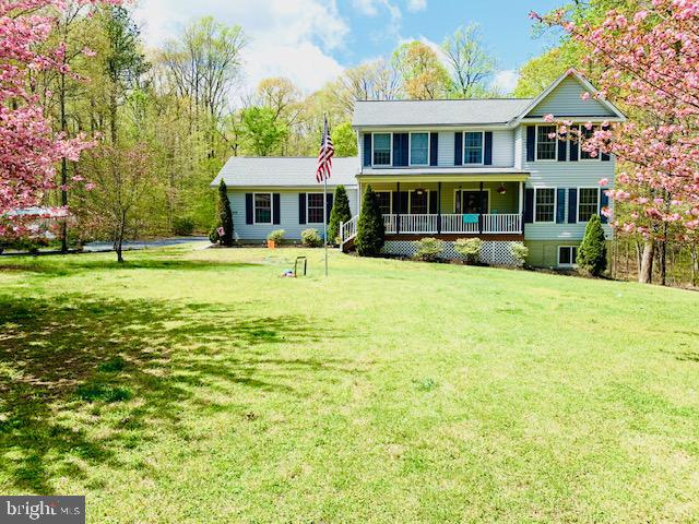 AWESOME 5 ACRE PRIVATE HOMESTEAD!!!   FENCED SECTIONS ARE READY FOR YOUR HORSES, GOATS, COWS AND CHICKENS!!! 3076 SQ FEET OF GARAGE AND POLE BARN SPACE (POLE BARN IS APPX. 50X50)!!  3360 SQUARE FOOT TWO STORY COLONIAL HOME WITH A WALK OUT BASEMENT!!! LARGE LIVING ROOM!! SEPARATE DINING ROOM!!  LARGE KITCHEN WITH BEAKFAST BAR AND TABLE SPACE!!!  FAMILY ROOM OFF THE KITCHEN WITH GAS FIREPLACE!!  1/2 BATH ON MAIN LEVEL!! UPPER LEVEL OF THE HOME FEATURES 4 BEDROOMS AND 2 FULL BATHROOMS!!! SPACIOUS PRIMARY BEDROOM WITH WALK IN CLOSET AND COLMPLETELY REMODELED BATHROOM WITH SOAKING TUB, WALK IN SHOWER, DUAL SINK VANITY!!  GO SEE THE HOUSE TODAY!!!