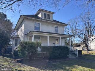 Second price adjustment has been made. Estate Sale - SOLD AS-IS offers great opportunity .This Colonial is loaded with potential and is in need of a updating or with this - Fantastic  Lot - you could do a tear down and build your dream home . This home offers 4 bedrooms on the upper level all with hardwood floors and 2 windows in each bedroom. The main level has a nice flow .There is a table space kitchen leading to a  large formal dining room . There is a nice living room and main level family room and all have hardwood floors. There are 9ft. ceilings through out. There is a great walk up attic for storage. The correct heat source is hot water baseboard  , fuel oil fired boiler. There is a partial basement where the boiler is located with concrete floor and provides an entrance to the crawl  space. The location is ideal near Riverfront Dining , Movies , Brewery , Pocomoke River Dockage  , Library , Fairgrounds , and more. The price is right.