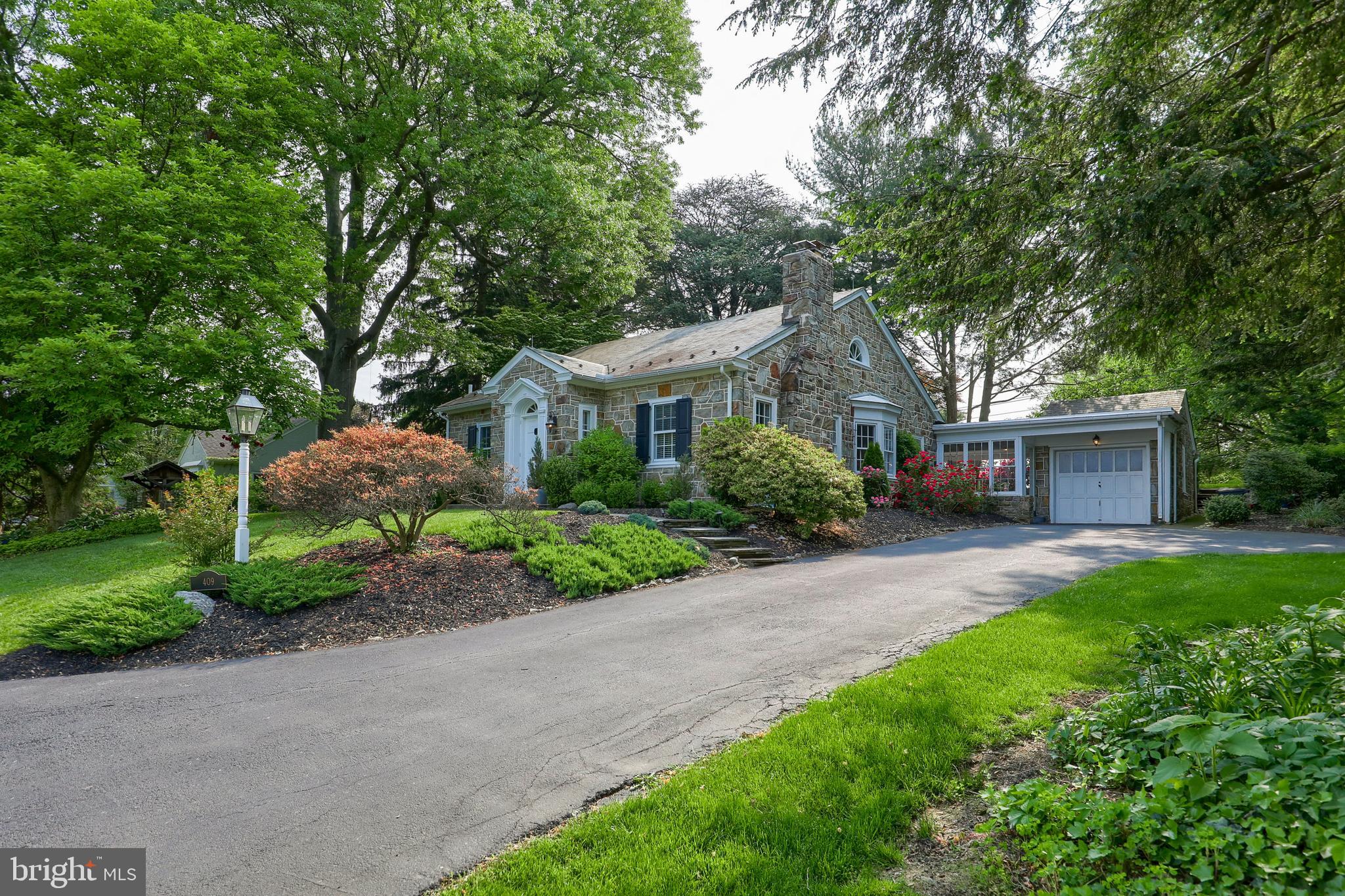 This stunning stone Cape Cod is located in a quiet, tree-lined street in the heart of Hamilton Park.  It has all the charm of a classic home, with thoughtful modern updates that make it perfect for today's lifestyle.  The living room is spacious and inviting, with a wood-burning fireplace that will make you feel cozy on cold winter nights.  The dining room is perfect for entertaining, with a bow window that lets in plenty of natural light.  The kitchen has been updated with stainless steel appliances, granite countertops, new flooring and plenty of cabinet storage space.  The first floor also offers two bedrooms with beautiful built-in cabinetry, a well appointed full bathroom and separate half bathroom.  Upstairs, you will find a large sitting area and two additional bedrooms.  The second full bathroom is also located upstairs.  The basement has been freshly painted, making it the perfect place for a playroom, media room, or home gym.  Step out of the kitchen onto the large 16x22 sunroom which leads to a cozy patio area.  The sunroom has received new glass panels, new doors and a fresh coat of paint.  Both spaces are perfect for entertaining guests or simply enjoying the private outdoor living space.  Additional finishes include graceful moldings, distinct built-ins and more.  This beautiful home is conveniently located to top-rated schools, healthcare, shopping, parks and a vibrant Downtown Lancaster.