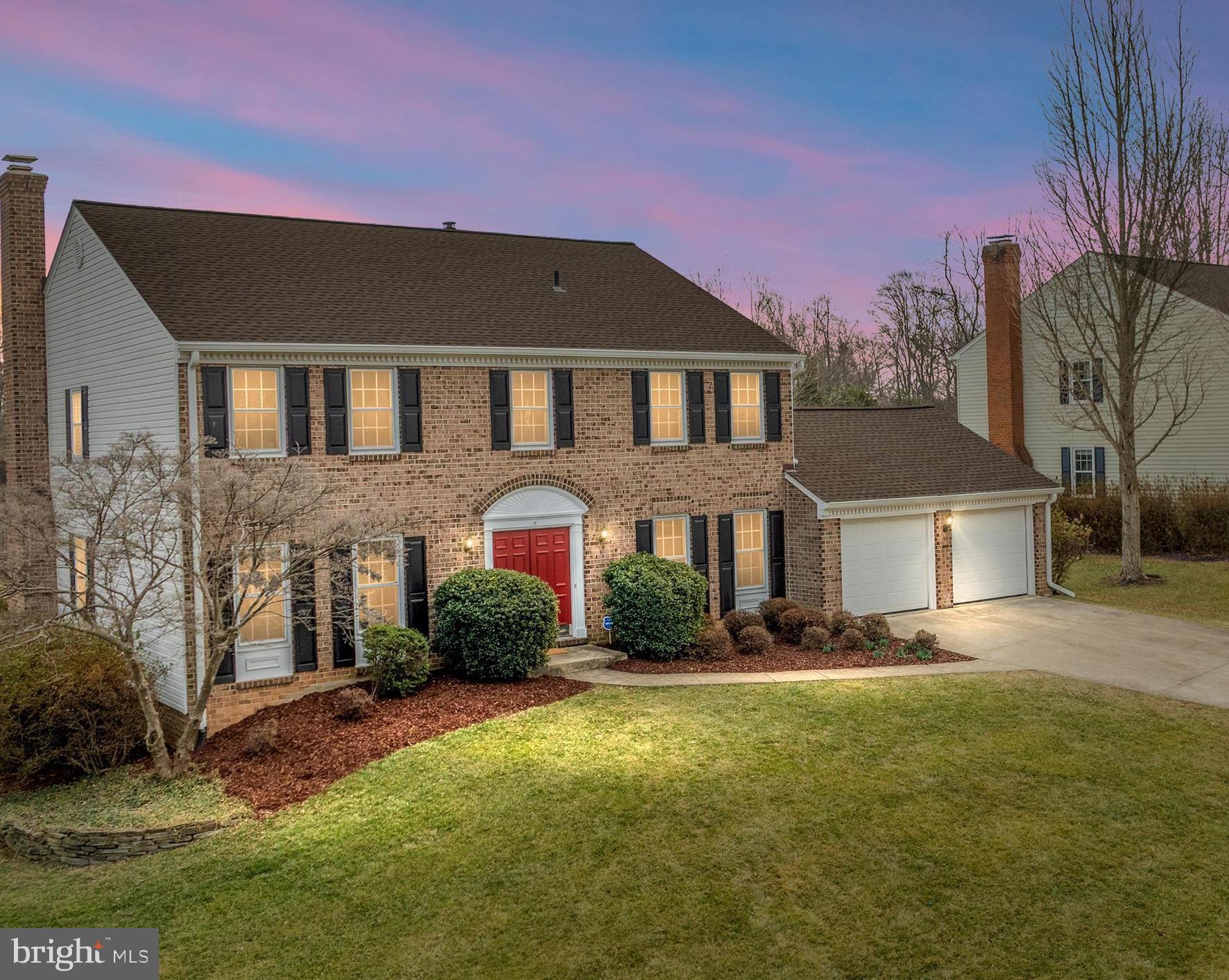 ACCEPTING BACK-UP OFFERS! Seller entertaining back-up offers. Stunning brick-front Colonial in the highly sought-after Fox Mill Woods community—where you'll enjoy the benefits of a prime Reston location with no HOA! This home’s unique and rare feature is the bonus sunroom/ legal bedroom with an en-suite FULL bath on the MAIN level! perfect for multi-generational main level living. Recent updates worth mentioning include a Whole Home Generac Generator (2020), New Roof (2020), HVAC (2018), improved Attic Insulation (2015), and an LG washer & dryer (2020).  Step into the inviting foyer, where Brazilian hardwood floors flow seamlessly throughout the main and upper levels. . The open, eat-in kitchen is bright and inviting, featuring Corian countertops, a peninsula island, a dedicated coffee/workstation, and recessed lighting. The adjacent family room boasts a charming brick wood-burning fireplace, built-in shelving, and exposed beams, creating a warm and cozy atmosphere. Entertain in style in the formal dining room with crown molding and chair railing, or utilize the spacious living room as a home office. A powder room and a convenient laundry room complete the main level. Upstairs, the home features four generously sized bedrooms. The primary suite includes chair rail and crown molding, two closets, a sitting area, and a spacious ensuite bath. The fully finished basement offers fresh carpeting, half bathroom that is plumbed for a full bath easily, another brick wood-burning fireplace, a versatile bonus room/gym, and a large storage/utility room with workspace. Outside, enjoy the level lot and low-maintenance Trex composite deck, perfect for outdoor relaxation and entertaining. This home offers an unbeatable combination of freedom, recreation, and convenience. Situated just outside Reston's HOA boundary, it provides the benefits of no HOA fees or restrictive covenants while still enjoying the area's exceptional amenities. Residents have access to the Fox Mill Woods Swim & Tennis Club, which features lighted pickleball courts, a playground, and a pavilion—perfect for community gatherings and outdoor fun. For nature lovers, the home is steps away from scenic paved and natural trails winding through multiple parks and woods, ideal for walking, biking, and exploring. Additionally, its prime location ensures unmatched accessibility, with close proximity to Dulles International Airport, the Dulles Toll Road, Reston Town Center, Fairfax County Parkway, Route 50, shopping, dining, parks, golf, and mass transit. Virtual 3D Tour, Floorplans, and Walk Through Video are available - Schedule your private tour now!