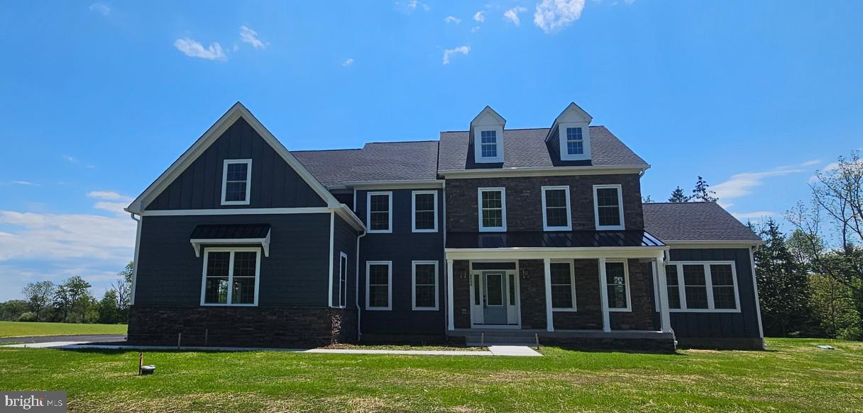 This stunning new construction custom home, built by The Webb Building Group, combines timeless craftsmanship with modern farmhouse design. Perfectly situated on a beautiful 1.44-acre corner lot in Pipersville, Bucks County, this property offers both space and serenity within the A+ rated Central Bucks School District. The Northampton Model features 4 bedrooms, 3.5 baths, and an open-concept floor plan ideal for today’s lifestyle. Step into the elegant two-story foyer, showcasing a solid oak staircase with craftsman-style rails. The first floor includes a private study or home office, a formal dining room, and a versitile flex room flooded with natural light to use as a sunroom, living room, or game room. The gourmet kitchen is a true showstopper, boasting quartz countertops, 42-inch Century cabinetry, a large center island with seating, stainless steel appliances, and a walk-in pantry. A butler’s pantry and full-size mudroom add convenience, while the kitchen and breakfast area flow seamlessly into the spacious great room featuring a designer gas fireplace just perfect for entertaining or cozy family nights. Upstairs, the expansive primary suite impresses with a tray ceiling, spa-like bath with freestanding soaking tub, oversized shower, and dual-sink vanity. You’ll also find two walk-in closets, a linen closet, and an additional sitting or dressing room. Bedrooms 2 and 3 share a stylish Jack and Jill bath, while Bedroom 4 enjoys a private ensuite bath. The second-floor laundry room includes a utility sink and washer/dryer hookups for added ease. Additional highlights include: 9-foot ceilings on the first floor and basement; hardwood and tile flooring throughout the main level; 3 car side entry garage; maintenance free vinyl siding and stone facade; luxurious trim moldings, Moen fixtures, century cabinets and double hung window.  All of this on a gorgeous flat corner lot surrounded by picturesque farmland. Get in early to customize your finishes and selections and make this incredible home truly your own!
*Photos of a similar model*
*Use GPS 6800 Groveland Rd*