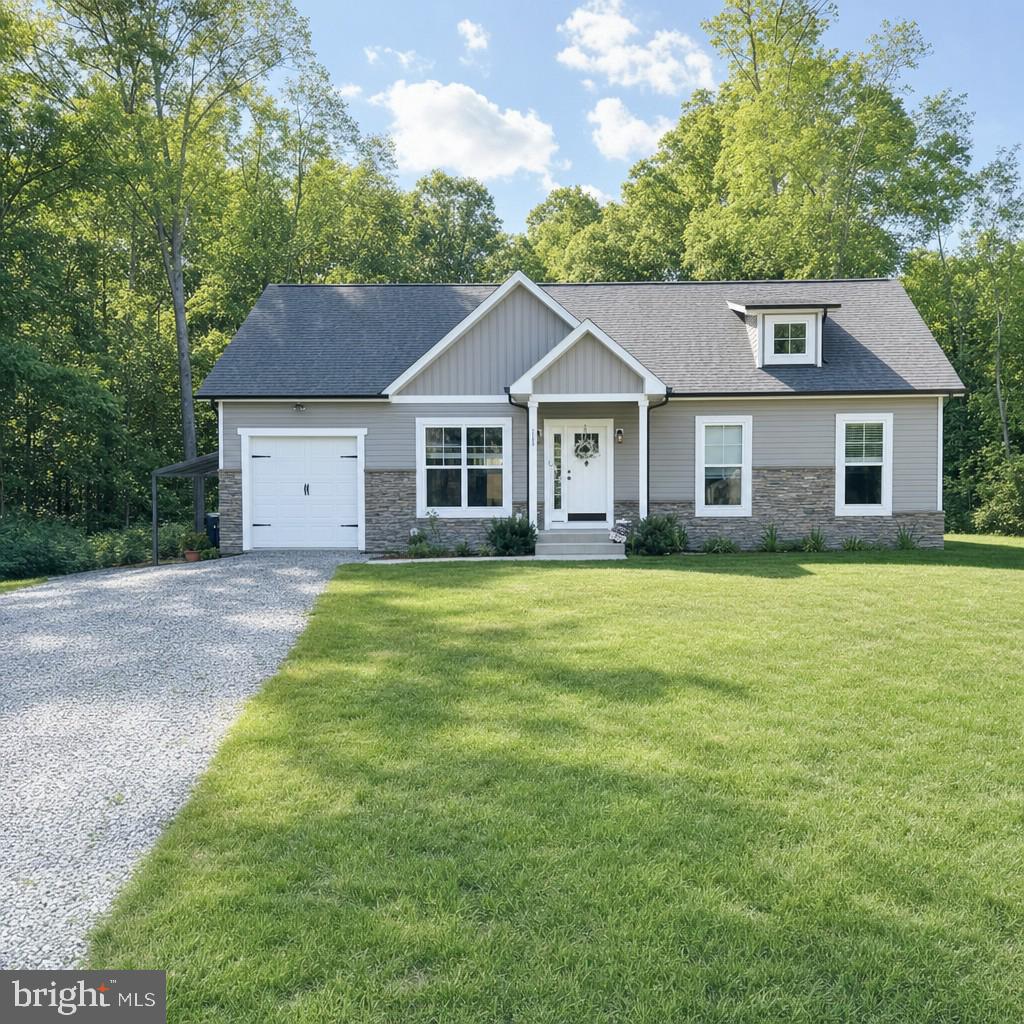 Welcome home to this practically new, beautifully maintained property offering the perfect blend of peaceful country living and everyday convenience. Situated on a spacious 1-acre lot along sought-after Macedonia Road, this charming residence features comfortable living spaces, abundant natural light, and a functional layout ideal for both relaxing and entertaining.

The home offers generously sized bedrooms, inviting common areas, and a well-appointed kitchen with ample cabinet and counter space. Step outside to enjoy the expansive yard with plenty of room for outdoor activities, gardening, pets, or future improvements. Mature trees and scenic surroundings create a private, tranquil setting while still being just minutes from shopping, dining, commuter routes, and all that Fredericksburg has to offer.

Whether you're looking for your first home, additional space, or a peaceful retreat with easy access to town, this property delivers exceptional value and opportunity. Don’t miss your chance to own a slice of countryside charm in a fantastic location!