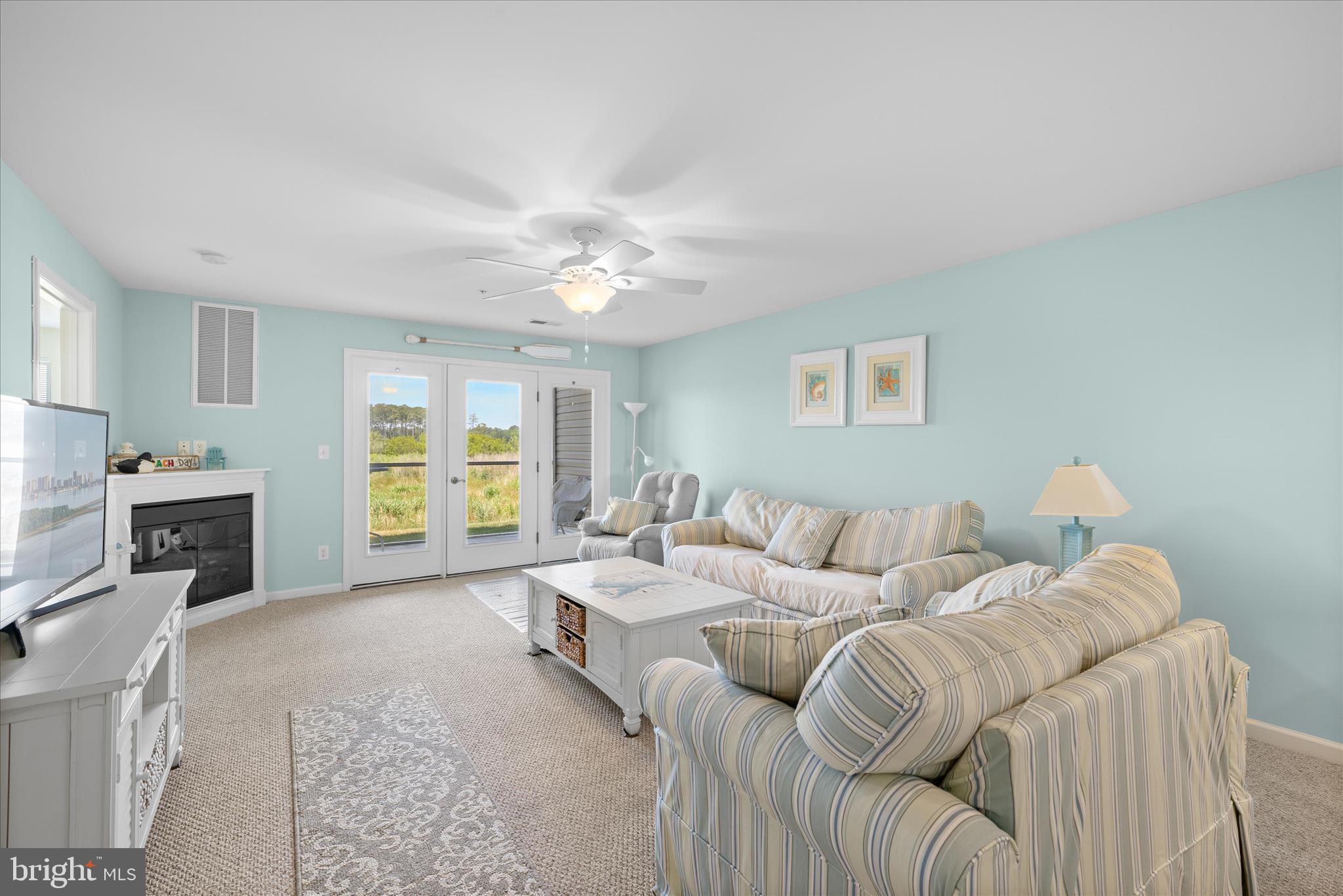 Welcome to your own slice of coastal paradise at 37462 Pettinaro Drive. This sun-drenched, first-floor retreat in the premier bayfront community of Bethany Bay offers the perfect blend of relaxation and recreation. Coming mostly furnished, this two-bedroom, two-bathroom home is ready for you to move right in and start enjoying the shore lifestyle from day one.

The heart of the home features a beautifully updated eat-in kitchen, complete with sleek granite countertops and stainless steel appliances—perfect for whipping up a meal after a day on the water. The open living space is anchored by a cozy fireplace, ideal for curling up on those crisp off-season evenings. From there, the floor plan flows seamlessly out to a private screened-in porch, creating the ultimate spot for morning coffee while taking in the serene, scenic views. Retreat to the primary bedroom featuring its own ensuite bathroom and lovely vistas to wake up to. With the added convenience of a private garage, you’ll have plenty of room for your vehicle and all your beach gear.

Living in Bethany Bay feels like being on a permanent vacation. The community is packed with high-end amenities, including a sparkling pool, tennis and pickleball courts, a fitness center, and a 9-hole golf course. If you love the water, you’re in luck—take advantage of the kayak launch, boat ramp, fishing pier, and on-site boat storage. For those who stay active, the basketball and volleyball courts, along with scenic trails, provide endless outdoor fun.

When you’re ready to explore, you’re just a quick trip away from the iconic boardwalk at Bethany Beach and Delaware’s stunning coastline. Local favorites for dining and shopping are right around the corner, giving you the best of both worlds: a resort-style sanctuary and easy access to everything the area has to offer. Don’t miss the chance to call this beautiful bayfront community home.