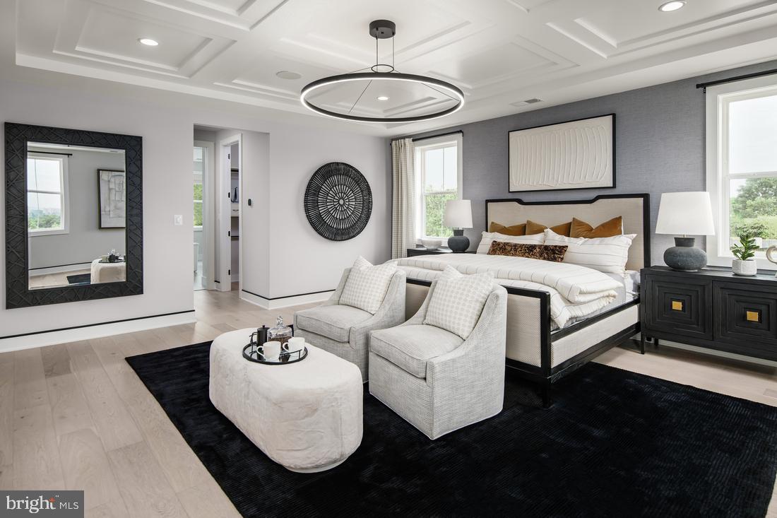 Discover the perfect blend of luxury and comfort in this exceptional 4,470 sq. ft. Toll Brothers single-family residence, available for move-in by Mid-August 2025. This beautifully designed home features five spacious bedrooms, four full bathrooms, and an additional half bath on the main floor, complemented by an oversized two-car garage and a charming stone driveway. With Designer curated premium high-end finishes. Enjoy a gourmet kitchen equipped with stainless steel Jenn Air appliances, upgraded cabinetry to the ceiling, and a generously sized island, ideal for culinary enthusiasts. The open-concept layout seamlessly connects the kitchen to the inviting great room, which features a cozy fireplace and a casual dining area, making it perfect for entertaining friends and family. Step through the front door into a grand, light-filled foyer with soaring 10-foot ceilings, leading to a versatile private office—perfect for a home office, playroom, or craft space. The second floor showcases a luxurious primary suite complete with a spa-like ensuite bathroom featuring dual vanities, a large linen closet, a freestanding Kohler soaking tub, and a walk-in shower. Three additional well-appointed bedrooms, each with walk-in closets, provide ample space for family or guests. This level also includes a convenient laundry room with a utility sink. The finished lower level offers a spacious recreation room with a wet bar, an additional bedroom, and a full bath—creating a welcoming retreat for guests or family gatherings. Don’t miss the chance to call this remarkable home yours. Located in the heart of Arlington, you’ll enjoy proximity to excellent schools, vibrant shopping, fine dining, and convenient commuter routes. Schedule your appointment today and prepare to embark on the next chapter of your dream lifestyle!