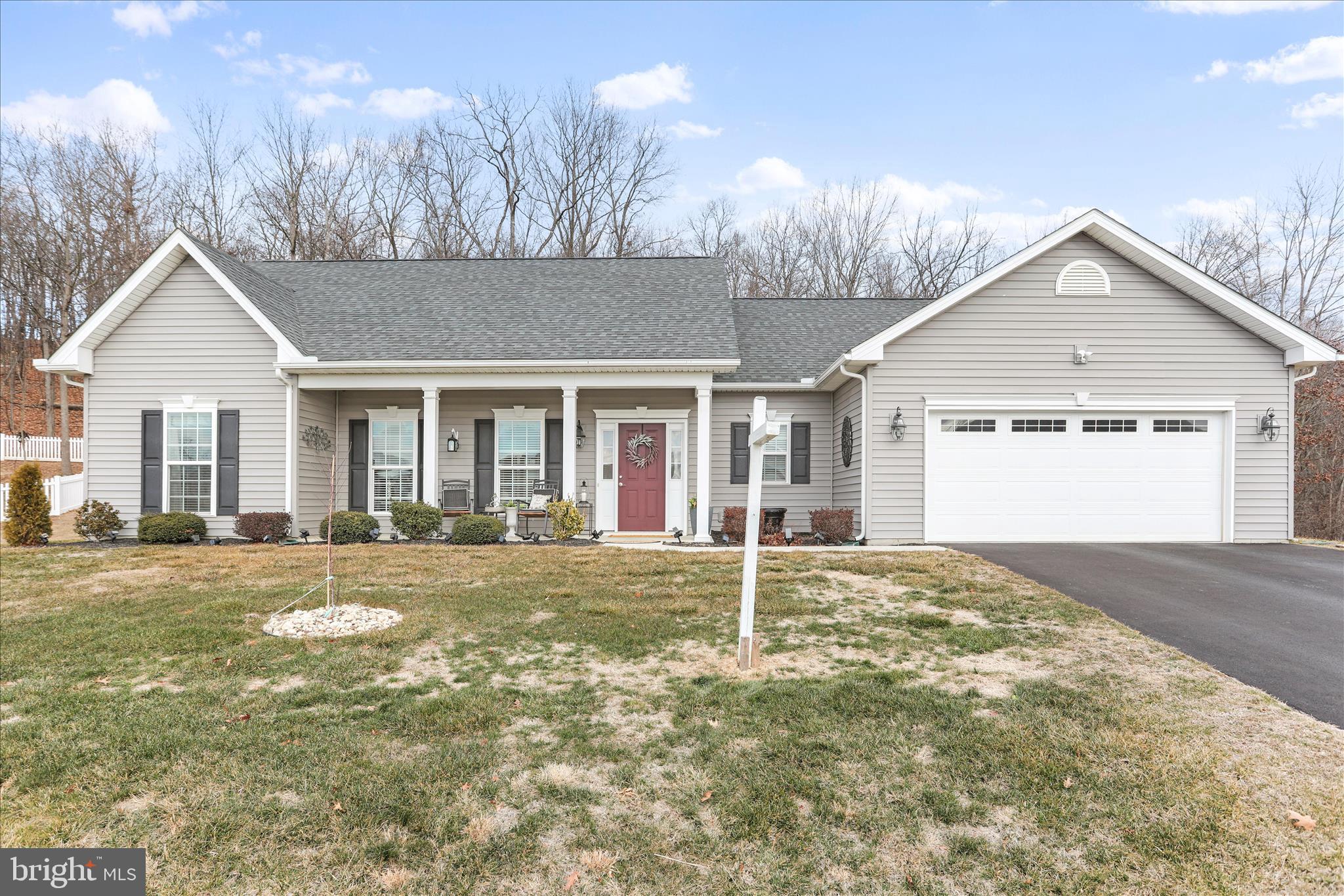 **** Highest and best by Sunday 8pm****Welcome home to this stunning, move-in-ready ranch-style home built in 2018, located on over half an acre in the highly desirable Brookfield community. This upgraded home offers 3 bedrooms, 2 full baths, and a 2-car garage, backing to wooded views with a screened-in rear porch, perfect for relaxing, entertaining, and enjoying peaceful mornings surrounded by nature.
The open-concept floor plan features luxury vinyl plank flooring, ideal for modern living. The spacious primary suite includes a large walk-in closet and a spa-like ensuite bath with dual vanities, soaking garden tub, and separate walk-in shower.
Two additional well-sized bedrooms with carpeted flooring and ample closet space are separated by a full guest bathroom, offering privacy and functionality. The chef-inspired kitchen boasts granite countertops, center island, upgraded cabinetry, and stylish backsplash with decorative range hood, making it ideal for everyday living and entertaining.
With over 1,700 square feet of living space, this home also features an inviting covered front porch, energy-efficient construction, and the added benefit of a non-buildable vacant lot next door for additional privacy. Conveniently located near shopping, dining, schools, and commuter routes, this home offers the perfect balance of comfort, privacy, and convenience.