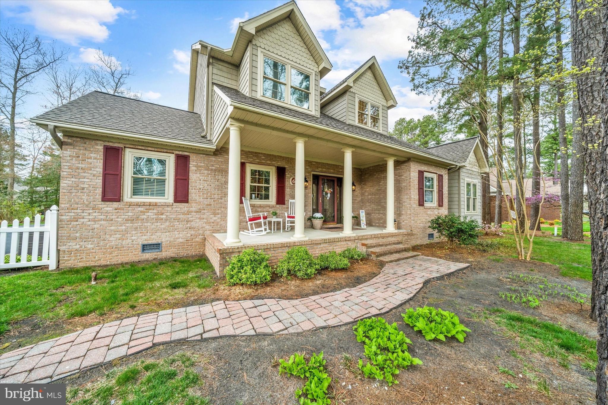 This Custom Built, Charming Cape Cod sits on over a half acre and backs to a beautiful pond view.  Located in sought after Cinderberry Estates, this premier home is one to see.  From the moment you step in to the foyer, you'll appreciate the very open floor plan.  The great room has beautiful flooring, vaulted ceiling and transom windows located above the tasteful gas fireplace that is the focal point of the room.  Open to the kitchen and dining area, it is a great home for entertaining guests.  The kitchen features gorgeous, custom maple cabinetry; tile flooring; recessed lighting; custom range hood vent; stainless appliances; and Silestone counter tops that give unique depth and color.  The main floor also has an office space, nursery/ 2nd office, pretty powder room and 1st floor laundry.  But, one of the best features is the main level primary bedroom with hardwood floor, large closets and 2 full baths!  Upstairs find a second living area in the loft, 3 additional bedrooms, a hall bath.  The screened porch and paver breezeway takes you to the oversized (26.5' x 24') 2 car garage that hosts a 1/2 bath and a full stairway to an additional storage area. There is also a (14 x 12) shed for storage.  From the great room, step through French doors to the back of the home that offers a relaxing oasis with a large deck and view of a pretty pond.  The home was just freshly painted with neutral colors.  Additional features include a Brand New Roof, Conditioned Crawl Space, Tankless Water Heater, 2-zone HVAC System, Irrigation System, Alarm System, Large Shed and an Updated Deck!  Located within 30 minutes to Delaware Beaches, this home is a great place to live!  Schedule your tour today!