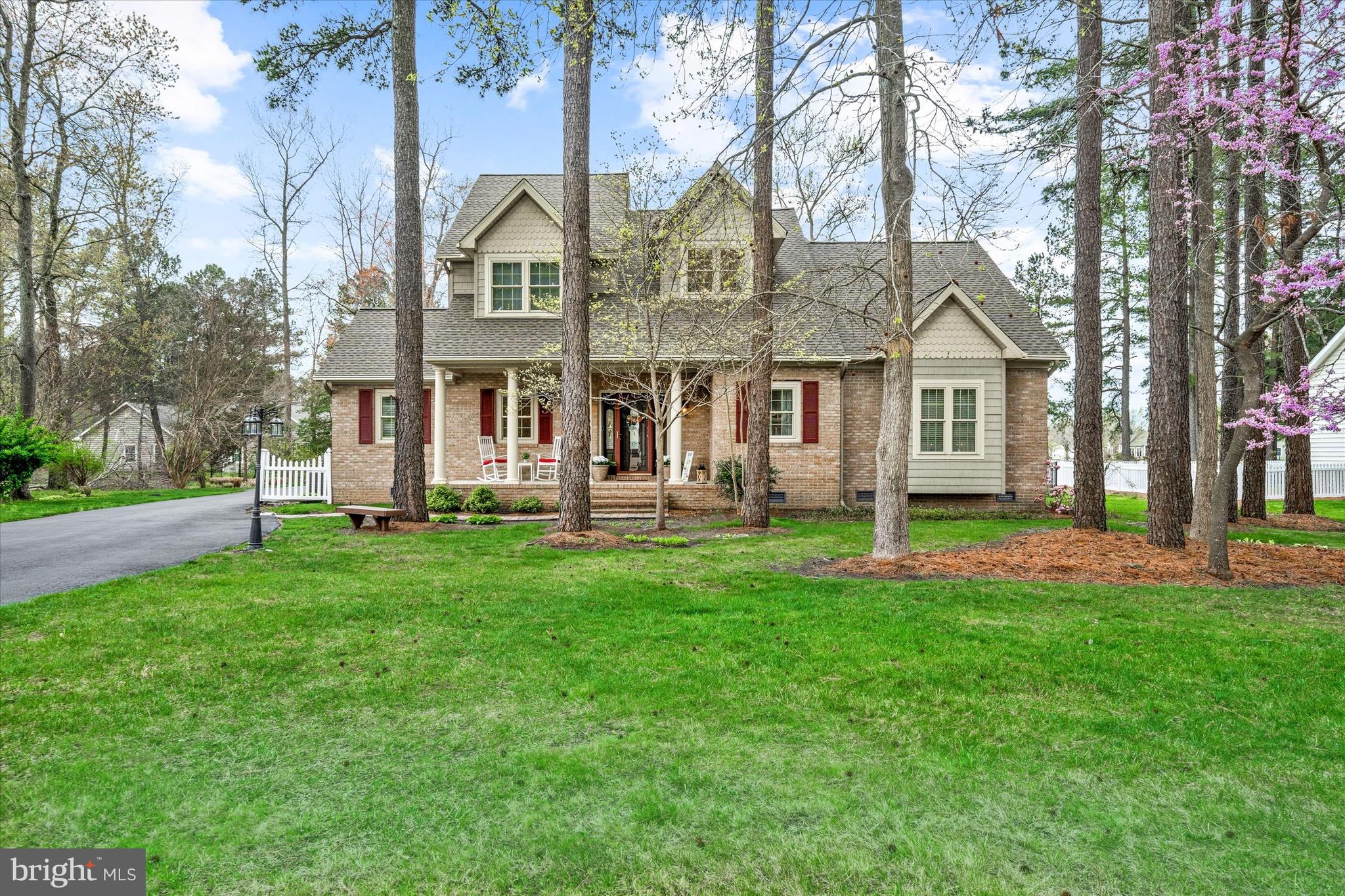 This Custom Built, Charming Cape Cod sits on over a half acre and backs to a beautiful pond view.  Located in sought after Cinderberry Estates, this premier home is one to see.  From the moment you step in to the foyer, you'll appreciate the very open floor plan.  The great room has beautiful flooring, vaulted ceiling and transom windows located above the tasteful gas fireplace that is the focal point of the room.  Open to the kitchen and dining area, it is a great home for entertaining guests.  The kitchen features gorgeous, custom maple cabinetry; tile flooring; recessed lighting; custom range hood vent; stainless appliances; and Silestone counter tops that give unique depth and color.  The main floor also has an office space, nursery/ 2nd office, pretty powder room and 1st floor laundry.  But, one of the best features is the main level primary bedroom with hardwood floor, large closets and 2 full baths!  Upstairs find a second living area in the loft, 2 additional bedrooms, a hall bath and another room that could easily be converted into a 4th bedroom.  The screened porch and paver breezeway takes you to the oversized (26.5' x 24') 2 car garage that hosts a 1/2 bath and a full stairway to an additional storage area. There is also a (14 x 12) shed for storage.  From the great room, step through French doors to the back of the home that offers a relaxing oasis with a large deck and view of a pretty pond.  The home was just freshly painted with neutral colors.  Additional features include a Brand New Roof, Conditioned Crawl Space, Tankless Water Heater, 2-zone HVAC System, Irrigation System, Alarm System, Large Shed and an Updated Deck!  Located within 30 minutes to Delaware Beaches, this home is a great place to live!  Schedule your tour today!