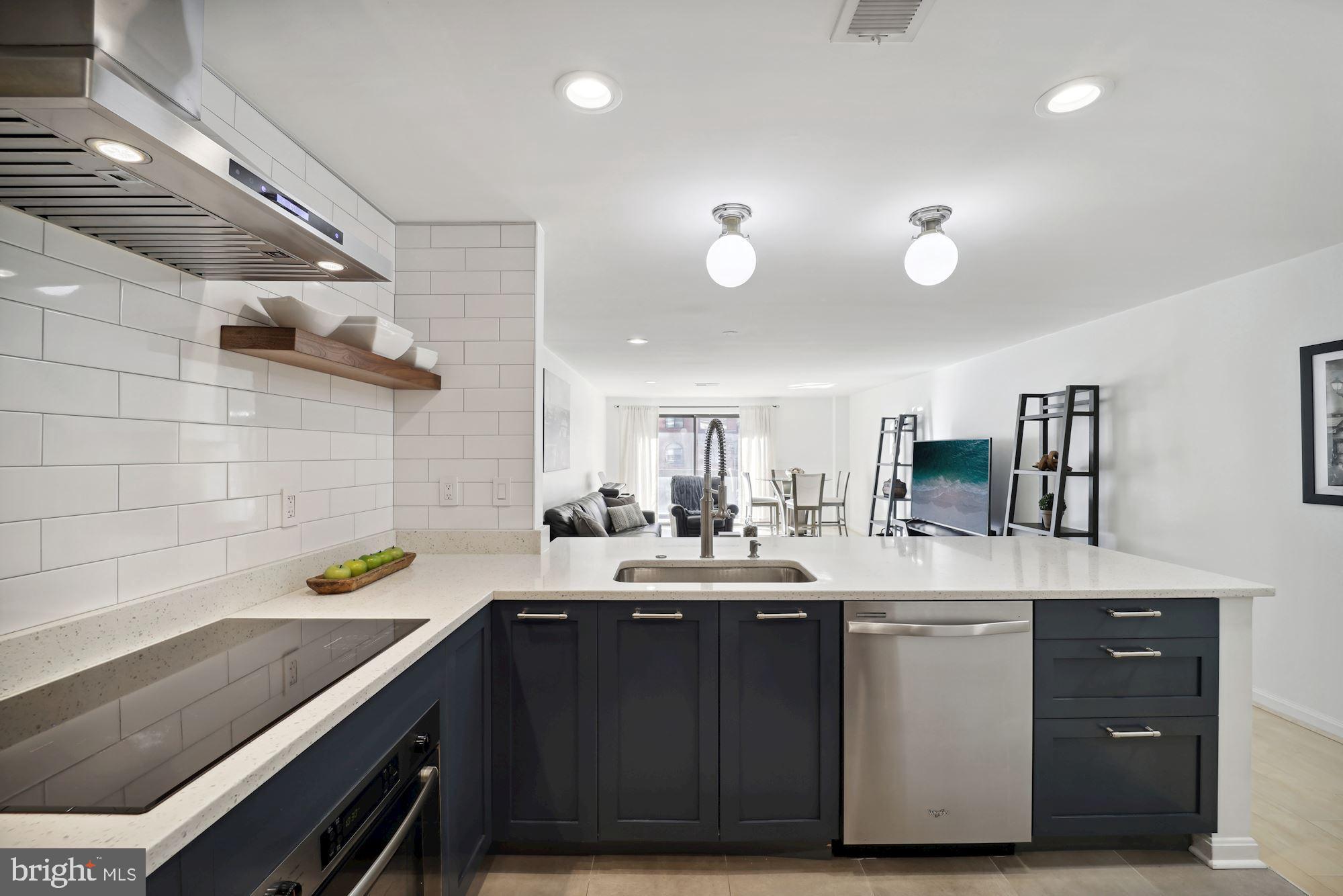 Incredible Value!  Absolutely stunning 2 bed 2 bath end-unit  condo in popular Ballston....just steps from the metro!  Open sun-filled floor plan with plenty of storage and generously sized rooms.  This unit has everything you could want.    Offering remodeled  kitchen  and bathrooms and  recently painted throughout make this  turn-key ready.  Indoor parking space, storage unit and bike rack in basement.    Enjoy the balcony and beautiful community patio after a long day!  Walk to favorite restaurants in minutes and easy access to shopping.    Short ride  to Washington DC on metro.  This will be your top pick!  Don't miss it!