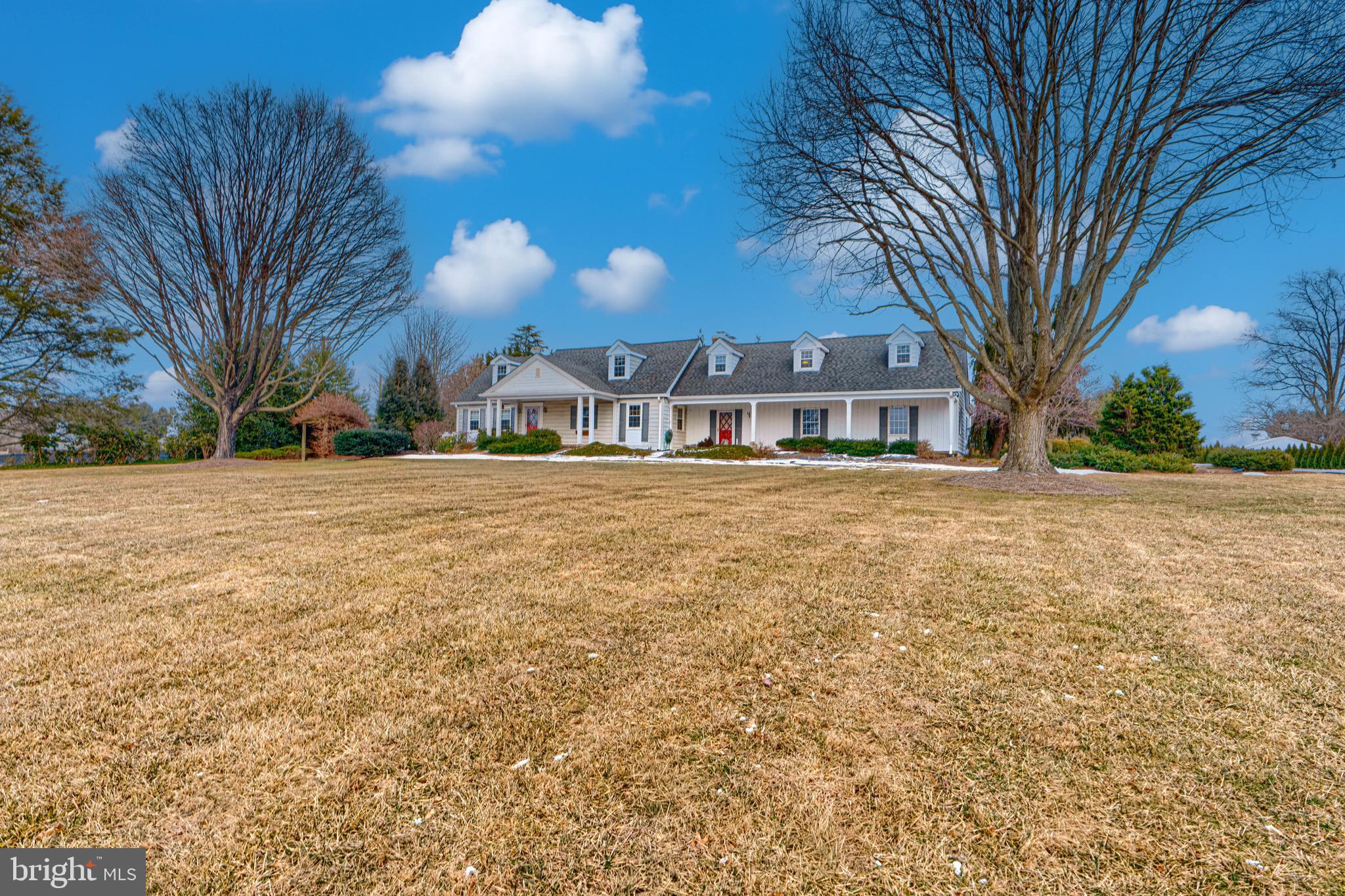 PRICE IMPROVEMENT!!  Welcome to this exceptional Cape Cod-style estate set on 4 level acres, offering 3,900 square feet of finished living space. Formerly known as Maryland Aquatics (a local business), this agriculturally zoned property is ideal for entrepreneurs, hobbyists, and car enthusiasts alike.
The home features 5 spacious bedrooms and 3 full bathrooms, including a highly desirable first-floor primary suite. The kitchen/family room combination is designed for both functionality and entertaining, featuring granite countertops, a center island, and ample cabinetry. Additional highlights include a sun-filled sunroom, cedar closet, and separate in-law quarters—perfect for extended family or guests.
Outdoor living is just as impressive with a covered front porch, low-maintenance vinyl deck, landscaping, and a tranquil koi pond, creating a serene retreat. The property is well-equipped for business or storage needs, with a massive 60x48 greenhouse, a 24x80 storage facility, and a 2-car garage.  The property comes with many updates, with a complete list available upon request.  Whether you're a car enthusiast seeking ample space for vehicle storage, a business owner needing room for equipment and supplies, or someone looking for a unique property with flexible use potential, this one-of-a-kind offering delivers space, versatility, and opportunity—all in a peaceful Jarrettsville setting.