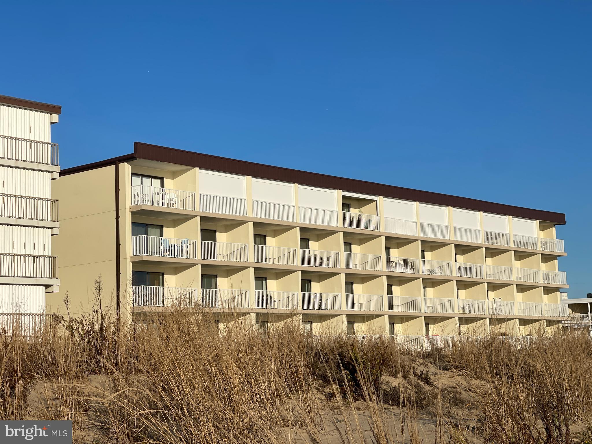 Lowest-price direct oceanfront unit in all of OCEAN CITY! This charming direct oceanfront unit in the coastal community of Cara Mar offers a delightful blend of comfort and convenience. Step inside to discover a thoughtfully designed open floor plan, featuring luxury vinyl plank flooring that enhances the inviting atmosphere. The renovated kitchen boasts upgraded sparkling quartz coastal countertops and stainless steel appliances which enhances the feeling of home at the beach. Enjoy the fresh air from your private balcony with sweeping sunrise views of “the ole’ Atlantic” and the convenience and safety of a powered hurricane shutter. Enjoy the private sparkling outdoor pool and beautifully maintained dunes. The secure, ground-level storage and laundry facilities add to the ease of life at Cara Mar. Located right on the ocean, this property provides a tranquil escape while being just a couple blocks from Northside Park, waterfront dining and countless places within a few blocks for ice cream! The community is known for its friendly atmosphere and offers convenient access to essential public services. With assigned parking and easy access to major routes, commuting is a breeze. Residents appreciate the proximity to local schools and community events, fostering a strong sense of belonging. The unit has been used for both personal enjoyment and as a rental unit with $60,000 gross generated in total over the past 2 years, making this unit a real cash cow! Reach out for AirBNB link for reviews. Whether you're looking for a weekend retreat or a year-round residence, this property is a perfect place to call home. Owner is a licensed real estate agent. Call agent for more information.