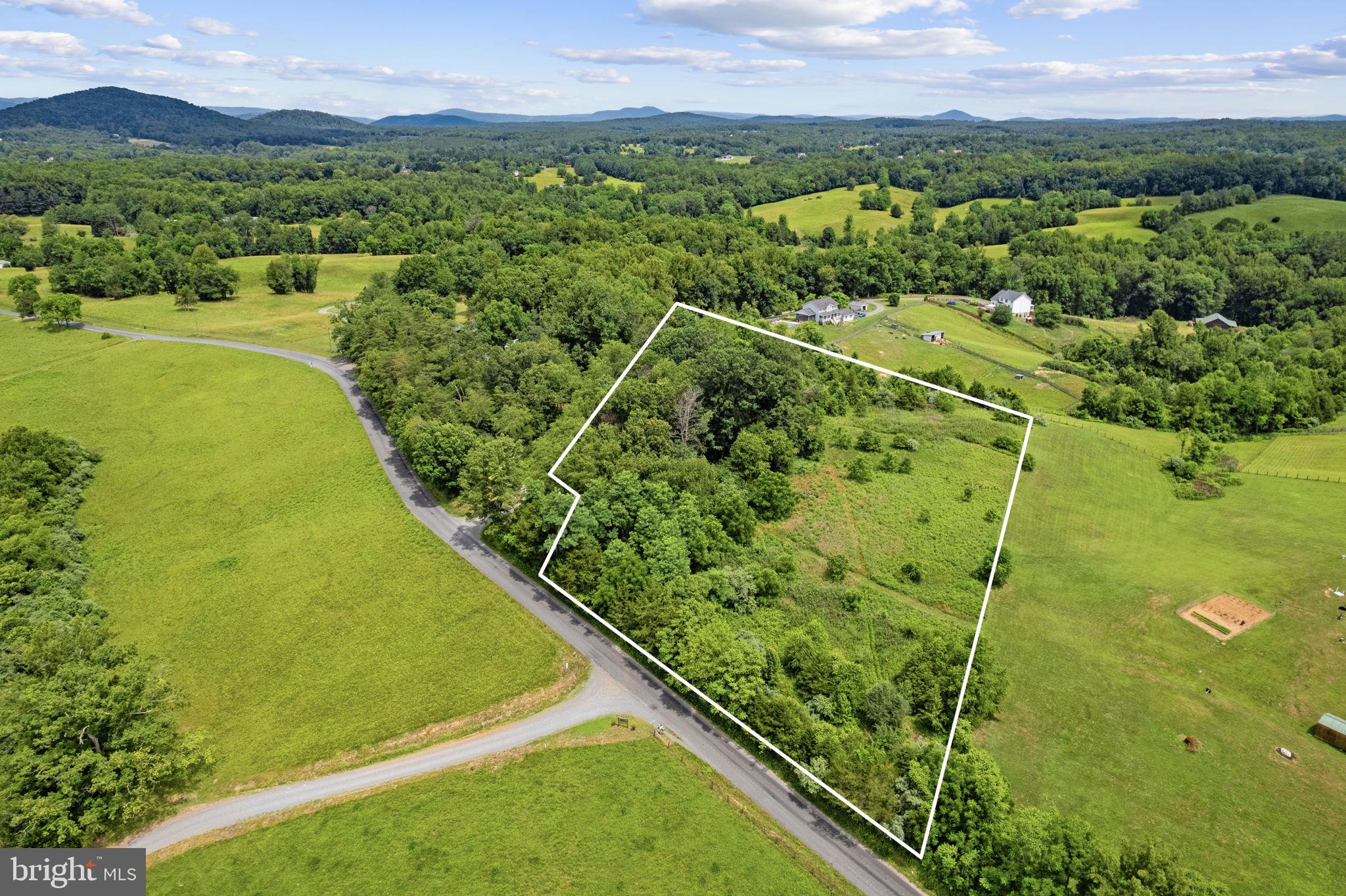 Discover the perfect canvas for your dream home on this beautiful 5-acre building lot, offering the ideal blend of privacy, accessibility, and scenic beauty. With ample road frontage for a future driveway, the property provides both convenience and flexibility in designing your ideal layout.

Enjoy breathtaking 180-degree pastoral views that stretch across rolling countryside, complemented by seasonal mountain vistas that create a stunning backdrop year-round. Whether you’re envisioning a custom home, a peaceful retreat, or a small estate, this property offers the space and setting to bring your vision to life.

With a gently rolling landscape and plenty of usable acreage, there’s room for outdoor living, gardens, or even a hobby farm. Experience the tranquility of rural living while still being within reach of nearby amenities.

Don’t miss this rare opportunity to own a scenic slice of countryside with incredible views and endless potential.