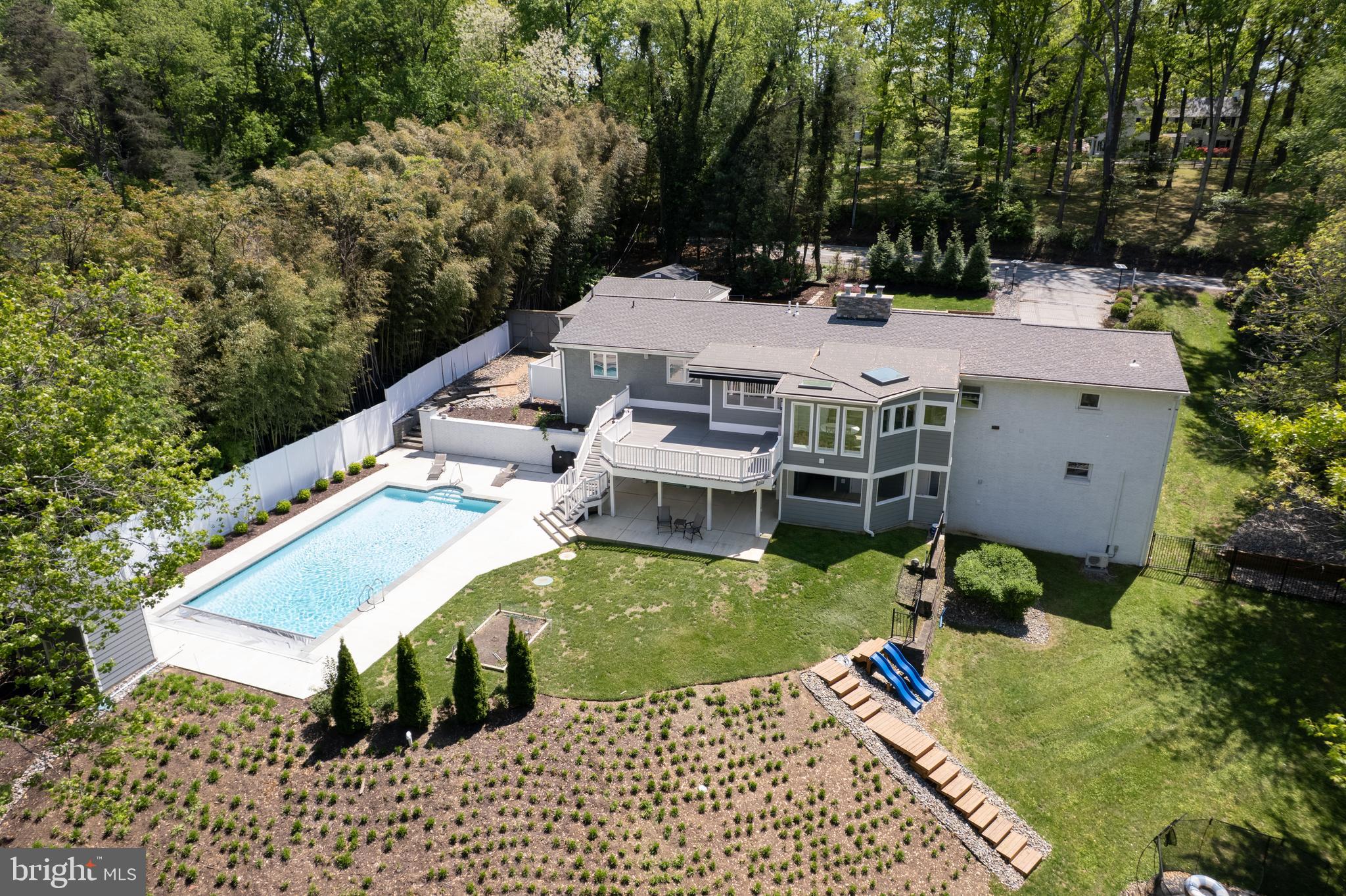 2728 Old Court Road offers a level of comfort and convenience that is rarely achieved in a single property — thoughtfully updated, exceptionally well maintained, and designed for effortless living from the moment you arrive.

Set back from the road and framed by mature landscaping, the home offers a sense of privacy that feels immediate, while remaining just minutes from shopping, dining, and everyday conveniences. It’s a balance that’s increasingly hard to find — tucked away, yet exceptionally well connected.

The main level is where the home truly distinguishes itself.

Designed for predominantly one-level living, the layout is expansive, intentional, and easy to navigate. Well-proportioned living and dining spaces transition seamlessly into a central family room, creating a natural flow that supports both everyday living and elevated entertaining.

At the center, the kitchen is built to perform. Anchored by a substantial island and offering generous prep space and storage, it opens to a light-filled breakfast area overlooking the backyard and pool. It’s a space that naturally draws people in — equally suited for a quiet start to the day or a full house gathered around.

The primary suite is conveniently located on the main level, offering a sense of privacy and ease with a well-appointed bath and walk-in closet. Additional bedrooms are thoughtfully positioned and scaled to provide flexibility without compromising flow.

The lower level extends the home in a meaningful way.

Fully finished and highly versatile, it offers a large recreation area, an additional flexible-use room, a full bedroom and bath, and a second laundry with utility sink. Whether accommodating extended stays, creating separation for work, or simply adding more room to live, it functions as a true secondary living environment.

Outside, the lifestyle comes into full focus.

The backyard is fully fenced and thoughtfully designed with distinct outdoor zones. A private pool with automatic cover anchors the space, while surrounding patio areas provide room for dining, lounging, and gathering. Just beyond, a dedicated play area with built-in slides creates an additional outdoor environment that feels intentional and separate, allowing the entire yard to function without overlap.

It’s a setting that supports both quiet afternoons and larger, effortless entertaining — the kind of home that naturally becomes the place people want to spend time.

A two-car garage, abundant storage, and thoughtful utility spaces further enhance the home’s overall ease and functionality.

Despite its private setting, the location remains exceptionally convenient. With close proximity to The Park School, Greenspring Station, Quarry Lake, and quick access to both 695 and 83, daily life moves seamlessly from here.

This is a home that has been carefully prepared and fully realized — where updates are complete, the layout works, and the experience is immediate.

Turnkey, elevated, and designed to live well at every level.