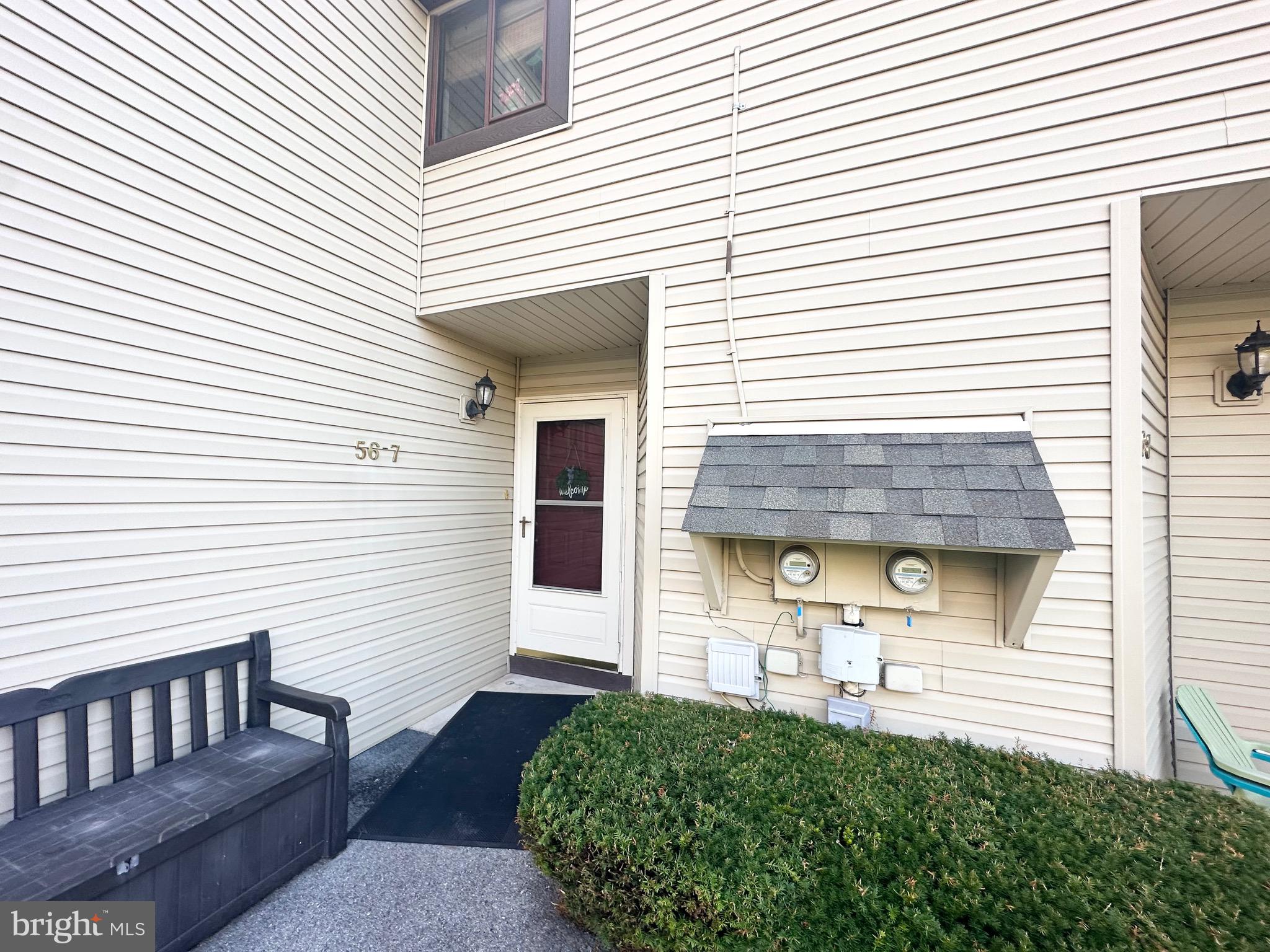 Welcome to 56-7 Holly Dr. This Laurel Springs Condo is situated in Exeter School District. The property
features an open floor plan throughout the main area, with an updated kitchen, dining room, and a large
living room. Down the hallway, you will find the second bedroom, main bathroom, and the primary suite
which includes a sizable bedroom, bathroom, and a walk-in closet. Off the living room, is also a covered
patio to enjoy some outdoor space. This home is part of the Laurel Springs HOA, the HOA includes
landscaping, snow removal, trash removal, exterior maintenance, a playground, and pool. Please contact  HOA directly for specifics.  Schedule your showing today!!