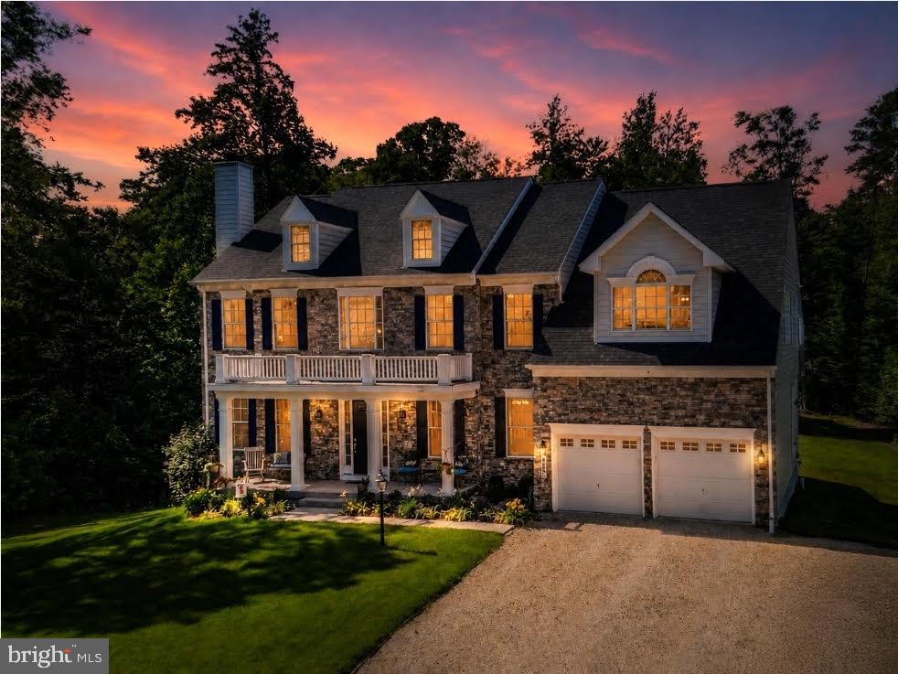 Welcome Home to an Extraordinary Private Estate in Owens Soper Estates
Hidden beyond a long, winding private driveway that gracefully meanders through 57 breathtaking acres of pristine woodland, this exceptional custom Colonial is the definition of luxury, privacy, and timeless elegance. Nestled within the prestigious Owens Soper Estates of Northern Calvert County, this is far more than a home—it is a once-in-a-lifetime opportunity to own an irreplaceable estate where every day feels like a private retreat surrounded by natural beauty, refined craftsmanship, and an unmistakable sense of grandeur.

From the moment you enter the driveway, the outside world begins to disappear. Towering hardwoods, peaceful streams, abundant wildlife, and the soothing sounds of nature create an unforgettable arrival, leading you home to a place where serenity and sophistication exist in perfect harmony. Properties offering this level of privacy, luxury, and recreation are exceptionally rare and nearly impossible to replicate.

Built in 2022, this stunning residence offers over 6,000 square feet of beautifully designed living space that blends refined craftsmanship with modern comfort. Every room has been thoughtfully designed to maximize elegance, functionality, and the breathtaking views surrounding the home.

The expansive floor plan features four spacious bedrooms with the flexibility to easily accommodate up to six bedrooms, making it ideal for multigenerational living, guests, or personalized spaces. The home also offers 4.5 luxurious bathrooms, including a spa-inspired owner’s suite featuring a spectacular custom tiled dual shower, relaxing Jacuzzi soaking tub, and elegant finishes that create the perfect private retreat.

At the heart of the home is a magnificent chef’s kitchen complete with premium finishes, an oversized center island, abundant cabinetry, and an impressive walk-in pantry. Whether hosting elegant gatherings or enjoying quiet evenings at home, this space was designed to bring people together. Two beautiful wood-burning fireplaces add warmth, charm, and timeless character throughout the living areas.

The fully finished lower level expands the home’s versatility with an impressive recreation room, oversized home gym, additional flex rooms, guest accommodations, and abundant storage.

Designed for today’s lifestyle, high-speed internet and two dedicated home offices allow you to work remotely while enjoying complete privacy and breathtaking natural surroundings.

Outside, approximately 2.5 acres surrounding the home have already been cleared, providing the perfect canvas for a future resort-style pool, outdoor kitchen, guest house, gardens, or luxury entertaining space while preserving the beauty and privacy of the surrounding forest.

Beyond the homesite, your own private outdoor paradise awaits. Miles of established trails, wide enough for ATVs, utility vehicles, horseback riding, or peaceful hikes, wind through mature hardwood forests alongside picturesque streams. Private bridge crossings provide easy access throughout the property, making every acre an adventure waiting to be explored.

Rich with deer, turkey, and abundant native wildlife, this property is a dream for hunters, outdoor enthusiasts, photographers, hikers, and nature lovers alike. Mature walnut, pawpaw, and valuable hardwood trees further enhance the property’s beauty while offering future stewardship opportunities.

With no HOA, you’ll enjoy the freedom to create the lifestyle you’ve always envisioned. Whether your dream includes a family compound, luxury outdoor amenities, a private homestead, or simply preserving your own secluded sanctuary, the possibilities are endless.

Despite its incredible privacy, you’re only minutes from top-rated Calvert County schools, shopping, restaurants, hospitals, parks, marinas, and the charming waterfront communities of Chesapeake Beach and North Beach, offering waterfront dining, fishing boutique shops.