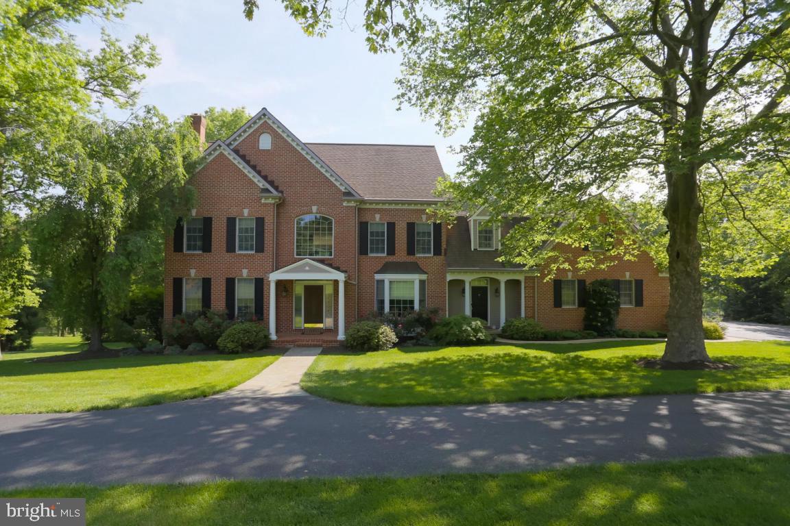 Please click for aerial video: https://vimeo.com/218511357.  Private setting on this 2.4 acre lot that backs up to the river on dead end road in Penn Manor's Doe Run Hills. Enjoy privacy on the back deck & patio, huge backyard w/in ground pool, covered gazebo area, outdoor fridge & fireplace. 5 bedroom home features granite eat in kitchen w/tile backsplash, island, Viking range, warming drawer, wine fridge & built in office to list a few of the many upgrades. Step down to family rm w/vaulted ceilings, wood burning fireplace & built in entertainment. Master suite with Jacuzzi tub, granite vanities, attic access & his/her closets. Finished lower level features a partial kitchen w/fridge, movie rm & fireplace. Other home features: hdwd flrs, recessed lighting, tray ceilings, wainscoting,