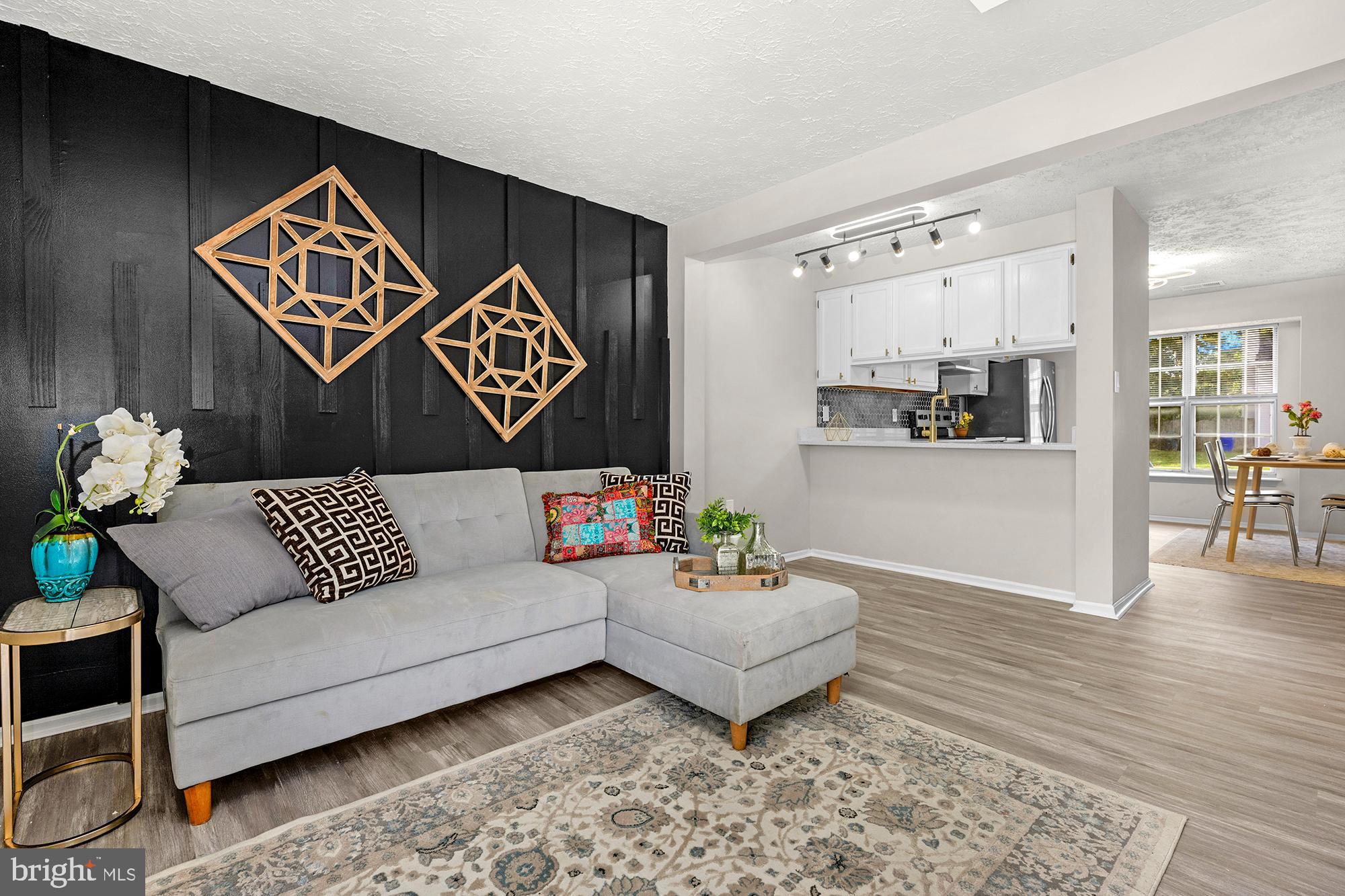Welcome to 1525 Pin Oak Drive in Waldorf! This charming townhouse in the White Oak Village community offers style, comfort, and convenience. The main level showcases a living room with a custom accent wall and tray ceiling, updated flooring, and a beautifully updsted kitchen with quartz countertops, tile backsplash, and stainless steel appliances, plus a convenient half bath. Upstairs you’ll find three large bedrooms, including a primary suite with private bath, along with a spacious hall bathroom.

White Oak Village is part of a well-kept community, providing neighborhood upkeep and value stability. Ideally located in Charles County, this home is close to shopping, restaurants, and schools in Waldorf, with easy access to Route 301, Route 5, and Branch Avenue for a quick commute to Washington, D.C., Joint Base Andrews, and Northern Virginia.

Move-in ready and thoughtfully updated, this home is the perfect blend of comfort, convenience, and location.