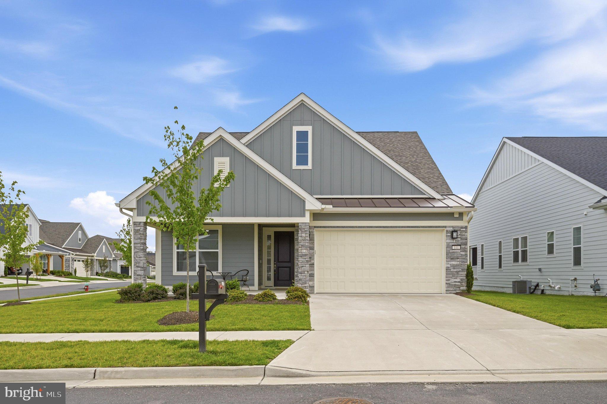 Welcome to effortless luxury living at Lake Frederick! Built in 2024, this exceptional 3-bedroom, 3-bath property offers over $150,000 in builder upgrades. Blending elegant design, thoughtful accessibility, and low-maintenance living on a premium corner lot in one of Virginia's premier 55+ communities.

The heart of the home is the gourmet kitchen, featuring upgraded cabinetry, quartz countertops, designer backsplash, premium stainless steel appliances, under-cabinet lighting, and an oversized island that's perfect for gathering. The open-concept layout flows seamlessly into the spacious family room, highlighted by a gas fireplace with custom built-ins, creating an inviting space for everyday living and entertaining.

Designed for comfortable main-level living, the home offers a main level laundry,  two spacious bedrooms, including a luxurious primary suite with dual vanities, a large walk-in shower, and an oversized walk-in closet.  An additional dedicated area with custom built-ins provides the perfect space for working from home, hobbies, or a quiet reading room. The entire home is ADA accessible with thoughtfully placed grab bars throughout, offering convenience without compromising style.

The upper level provides a private retreat featuring a spacious loft, separate sitting area, third bedroom, and full bath, ideal for overnight guests, multigenerational living, or a live-in caregiver.

Outdoor living is just as impressive with a welcoming covered front porch for morning coffee and a screened rear porch overlooking the extended patio, creating the perfect setting for relaxing or entertaining family and friends.

Additional features include a 2-car garage, washer and gas dryer that convey, luxury engineered hardwood flooring, designer tile upgrades, whole-home smart technology, upgraded insulation, humidifier, and countless premium builder finishes throughout.

Life at Trilogy at Lake Frederick is about more than just the home, It's a lifestyle. The HOA provides lawn mowing, trimming, and exterior maintenance, allowing you to enjoy the community's resort-style amenities, including a 117-acre lake for fishing and kayaking, indoor and outdoor pools, a stunning clubhouse, fitness center, tennis and pickleball courts, walking trails, on-site restaurant and bar, arts and crafts studio, game rooms, dog park, community gardens, and an active social calendar filled with clubs, events, and activities.

Better than new and loaded with upgrades you won't find in standard new construction, this exceptional home offers the perfect combination of luxury, comfort, and carefree living.   ** inside photos coming, accepting showings 7/9/26