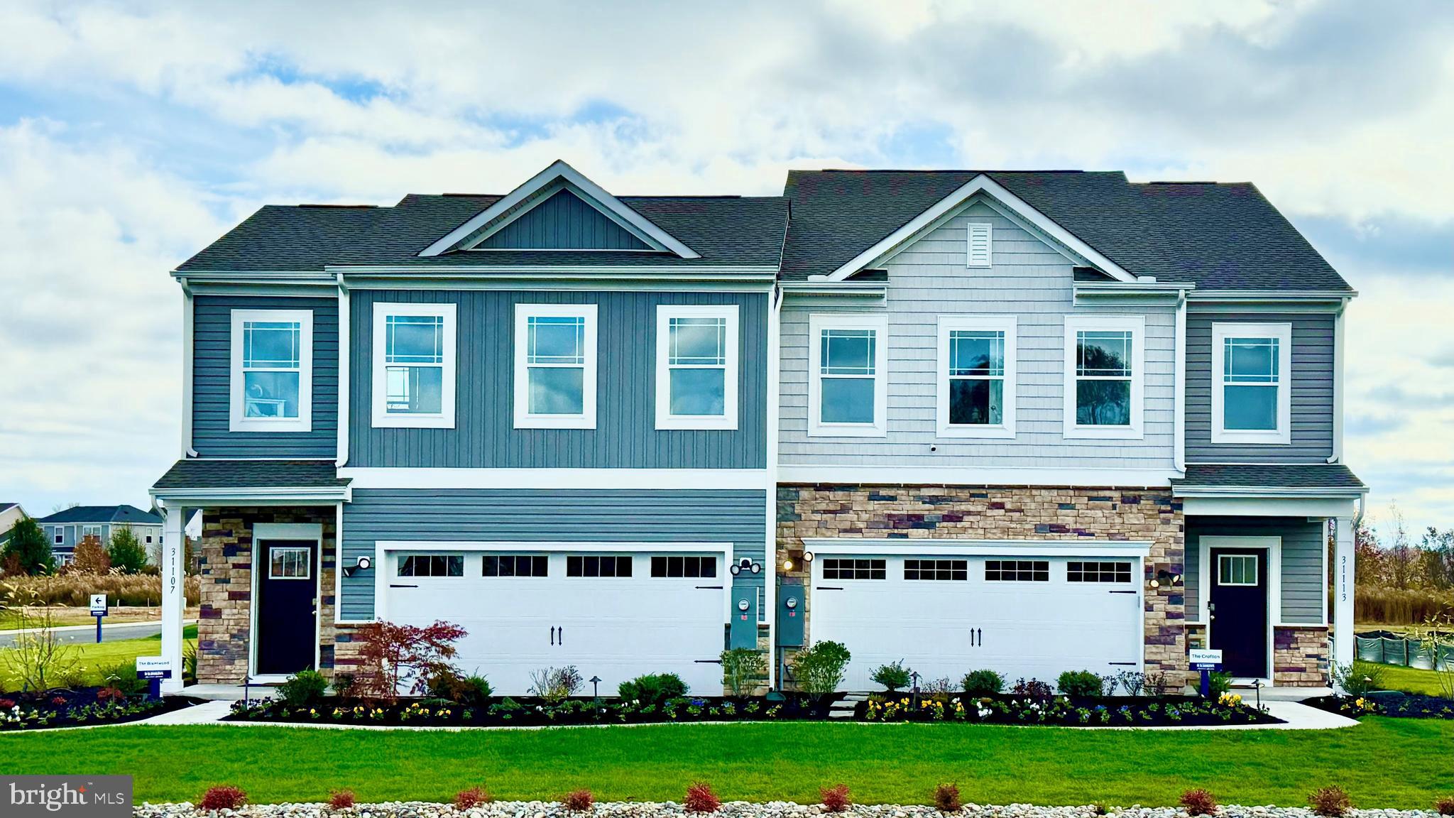 Come and see a new twin villa home at 9349 Greenway Trail at Coastal Villages in Selbyville, DE. The impressive Crofton, a 2,313 square foot open concept two-story villa, offers four bedrooms, two and a half bathrooms, and a two-car garage.

 The inviting foyer offers a convenient powder room, coat closet, and easy access to the garage. The home's well-appointed kitchen boasts modern soft-close white cabinetry, quartz countertops, an oversized island, a pantry closet, and stainless steel appliances. The spacious dining area, centered kitchen, and expansive great room are all open and allow for family and friends to gather comfortably. 

Upstairs, the large owner’s bedroom has a walk-in closet and a modern bathroom with a double bowl vanity, a generously sized shower, and a linen closet. There are three additional guest bedrooms, all with plentiful closet space, a guest bathroom with a double bowl vanity, a functional laundry room, and a large hallway linen closet. 

Your new home comes complete with white window treatments, a fully sodded, landscaped, and irrigated lawn, and exclusive America’s smart home® package, ensuring your peace of mind and comfort in every aspect of living.

Pictures, artist renderings, photographs, colors, features, and sizes are for illustration purposes only and will vary from the homes as built. Image representative of plan only and may vary as built. Images are of model home and include custom design features that may not be available in other homes. Furnishings and decorative items not included with home purchase.