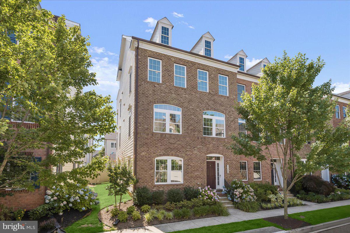 The home is now vacant & available for immediate occupancy! Welcome home to 11285 Terrace Lane in the highly desired Westside District of Maple Lawn! This is a huge and rarely available Andrew Carnegie Model end-of-group four-level NV townhome featuring 4 bedrooms, 4.5 bathrooms and 4,080 square feet of luxury living space. 

The first level foyer leads to an office/den area with a custom Murphy bed. There’s a full bathroom on this level as well as a storage closet. Other highlights of this level include the large recreation room with custom wet bar and beverage fridge and the covered brick paver patio. 

Ascend to the second level and you’ll find a beautiful open layout kitchen with quartz countertops, subway tile backsplash and under-cabinet lighting. The focal points of the spacious main living area are the custom built-in cabinetry and stone fireplace. The large Trex deck with custom lighting is accessible from this level and you’ll also find an additional half bath. 

Your enormous primary suite awaits on the third level with a tray ceiling and two large walk-in closets. The primary bathroom features a dual-sink vanity and a shower with two shower heads. There are also two secondary bedrooms with a shared bathroom on this level as well as a laundry room.

More entertainment areas await on the fourth level. Enjoy an additional wet bar with beverage fridge on this level as well as another full bathroom, a huge walk-in storage closet and one of Maple Lawn’s coveted roof-top terraces. 

Conveniently located close to all major Baltimore/DC commuter routes, and with enviable amenities including a resort-style community pool, tennis courts, pickleball courts, basketball courts, state-of-the-art gym and more, you’ll quickly see why Maple Lawn is one of the most sought-after communities in the region.