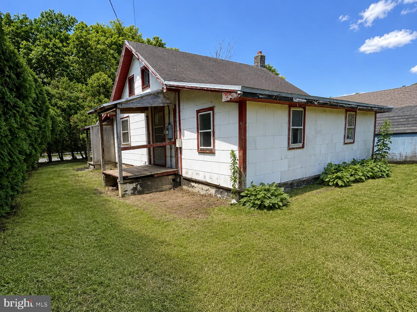 Welcome to 1309 W Philadelphia Avenue, a charming bungalow full of character, potential, and opportunity in the heart of Boyertown. Offering approximately 897 square feet of living space, this 2-bedroom, 1-bath home invites you to imagine the possibilities of creating a space that truly reflects your personal style. Whether you're a homeowner ready to add your own finishing touches or an investor seeking your next project, this property provides a wonderful canvas to bring your vision to life. A welcoming covered front porch greets you upon arrival, creating the perfect place to enjoy your morning coffee or unwind at the end of the day while taking in the peaceful surroundings. Step inside to discover a comfortable living room filled with natural light that flows effortlessly into the dining area, creating an inviting layout for everyday living and entertaining alike. The spacious eat-in kitchen offers generous room for gathering, meal preparation, and future updates, making it easy to envision transforming it into the heart of the home. Just beyond, two comfortable bedrooms provide cozy retreats, each offering warmth, natural light, and versatility to suit your lifestyle. The full bathroom is conveniently located to serve both bedrooms and guests. The full basement adds valuable storage space and flexibility for hobbies, a workshop, or future improvements, while the detached one-car garage provides additional storage and protected parking. Outside, the backyard offers plenty of room to relax, garden, entertain, or simply enjoy the outdoors, giving you the opportunity to create your own private retreat. This home presents an excellent opportunity for buyers looking to build equity through updates and personalization. With its functional floor plan, inviting outdoor spaces, and timeless character, the possibilities are endless for creating a comfortable residence tailored to your needs. Conveniently located near local parks, schools, shopping, dining, and everyday amenities, you'll enjoy the balance of small-town charm with easy access to nearby conveniences and major commuter routes. If you've been searching for an opportunity to restore the character of a classic bungalow and make it your own, 1309 W Philadelphia Avenue is ready to inspire your next chapter. Schedule your private tour today! Photos are digitally enhanced. Being sold AS IS, WHERE IS, Buyer is responsible for all inspections and any city requirements to close. All information and property details set forth in this listing, including all utilities and all room dimensions which are approximate and deemed reliable but not guaranteed and should be independently verified if any person intends to engage in a transaction based upon it. Seller/current owner does not represent and/or guarantee that all property information and details have been provided in this MLS listing.