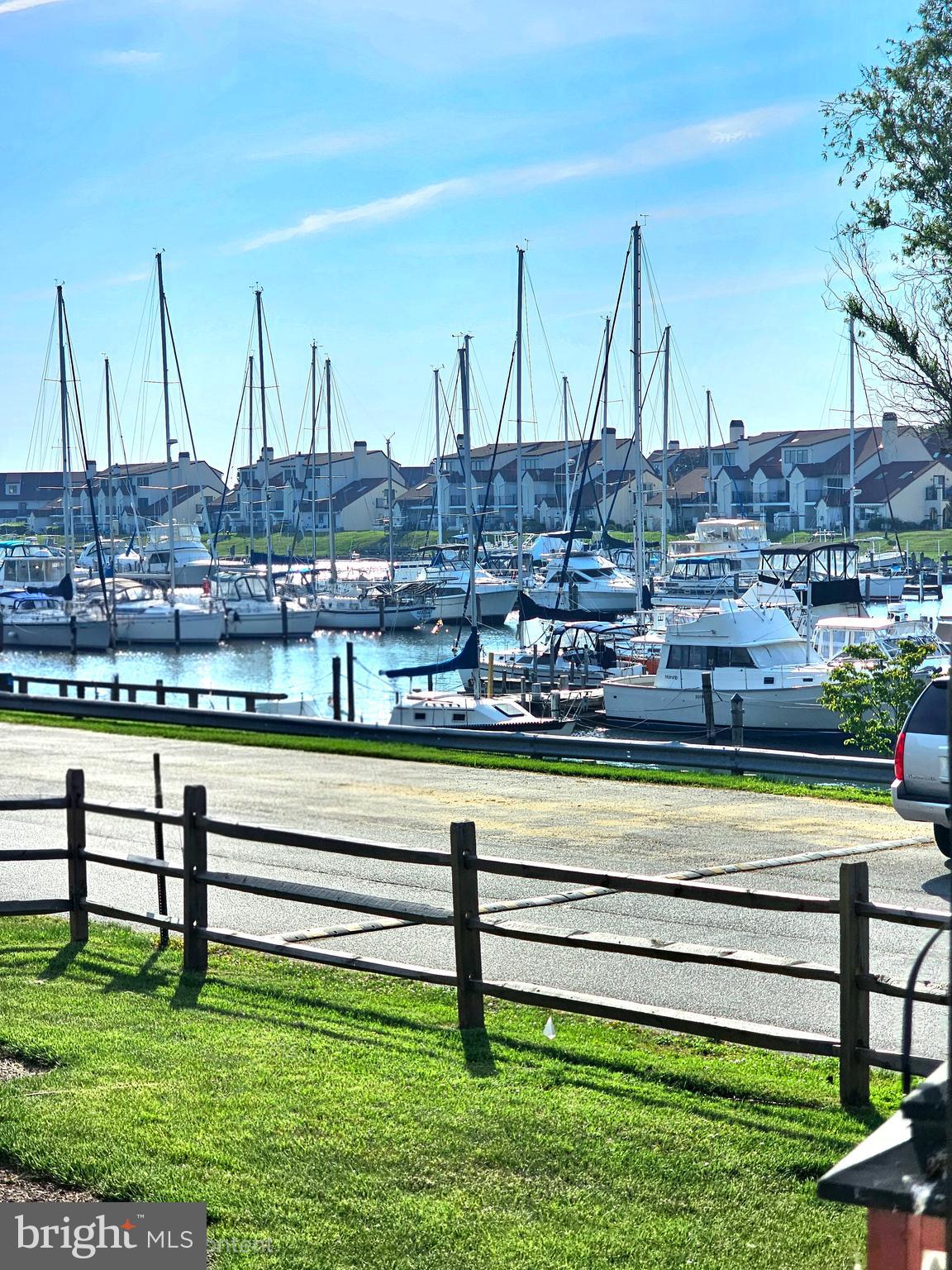 Welcome to Bayside, where coastal living and resort-style amenities come together in one of the area’s most desirable waterfront communities. This 3-bedroom, 2.5-bath condo offers a relaxing marina-side setting with both upper and lower decks overlooking the marina, creating the perfect backdrop for morning coffee, evening sunsets, and everything in between.

Inside, you’ll find a spacious layout designed for comfortable living, complete with a cozy gas fireplace, generous living spaces, and the convenience of a 1-car garage. Recent improvements include a new roof in 2023 and the front foot fee paid off in 2024, as well as a one-year home warranty for the buyer — adding additional value and peace of mind for the next owner.

Life in Bayside is all about lifestyle. Residents enjoy access to resort-style amenities including a clubhouse, outdoor pool, fitness center, tennis courts, volleyball courts, and scenic walking and jogging trails — all just steps from the marina and moments from the Chesapeake Bay.

Perfectly located near waterfront restaurants, local shops, and major commuter routes to Annapolis, Baltimore, and Washington D.C., this home offers the ideal blend of relaxation and accessibility. Whether you’re searching for a full-time residence or the perfect weekend waterfront escape, this Bayside condo captures the very best of Eastern Shore living.