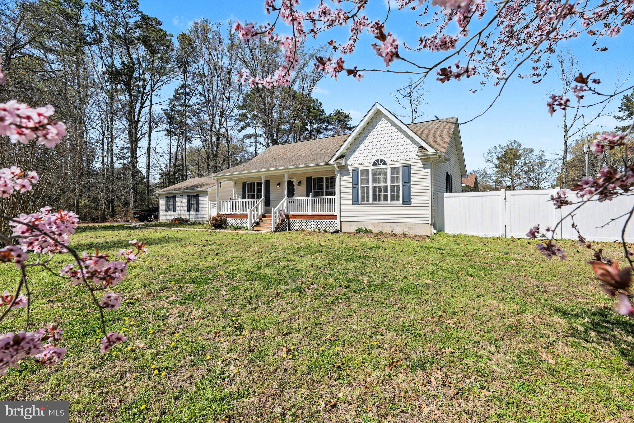 Beautifully maintained corner-lot home in Potomac Shores—easy, one-level living at its best. With 3 bedrooms, 2 bathrooms, and 1,258 square feet, this home checks all the right boxes without any wasted space. (Within the past two to three years: brand new HVAC, hot water heater, dishwasher, stove, microwave and refrigerator!)
You’ll love the welcoming front porch (perfect for morning coffee), plus an open floor plan with high ceilings and tons of natural light. Hardwood floors run through the main living area, while the bedrooms stay cozy with carpet. The kitchen is dialed in with all new stainless steel appliances and granite countertops, open area for dining just off the kitchen with glass french doors that open to the outside. 
The primary suite is spacious and comfortable, featuring a walk-in closet and a large soaking tub that’s ready for end-of-day unwinding.
Outside, you’ve got a fenced side yard for privacy, plus a detached 2-car garage for storage and parking.
Bonus perks:
Optional Potomac Westmoreland Shores Civic Association membership is just $40/year
Boat ramp access key is $50/year (about 1 mile away)
Private community beach and clubhouse are just a short stroll—approximately 0.04 miles
Easy living, great amenities, and a location that lets you enjoy the water without the waterfront price tag.