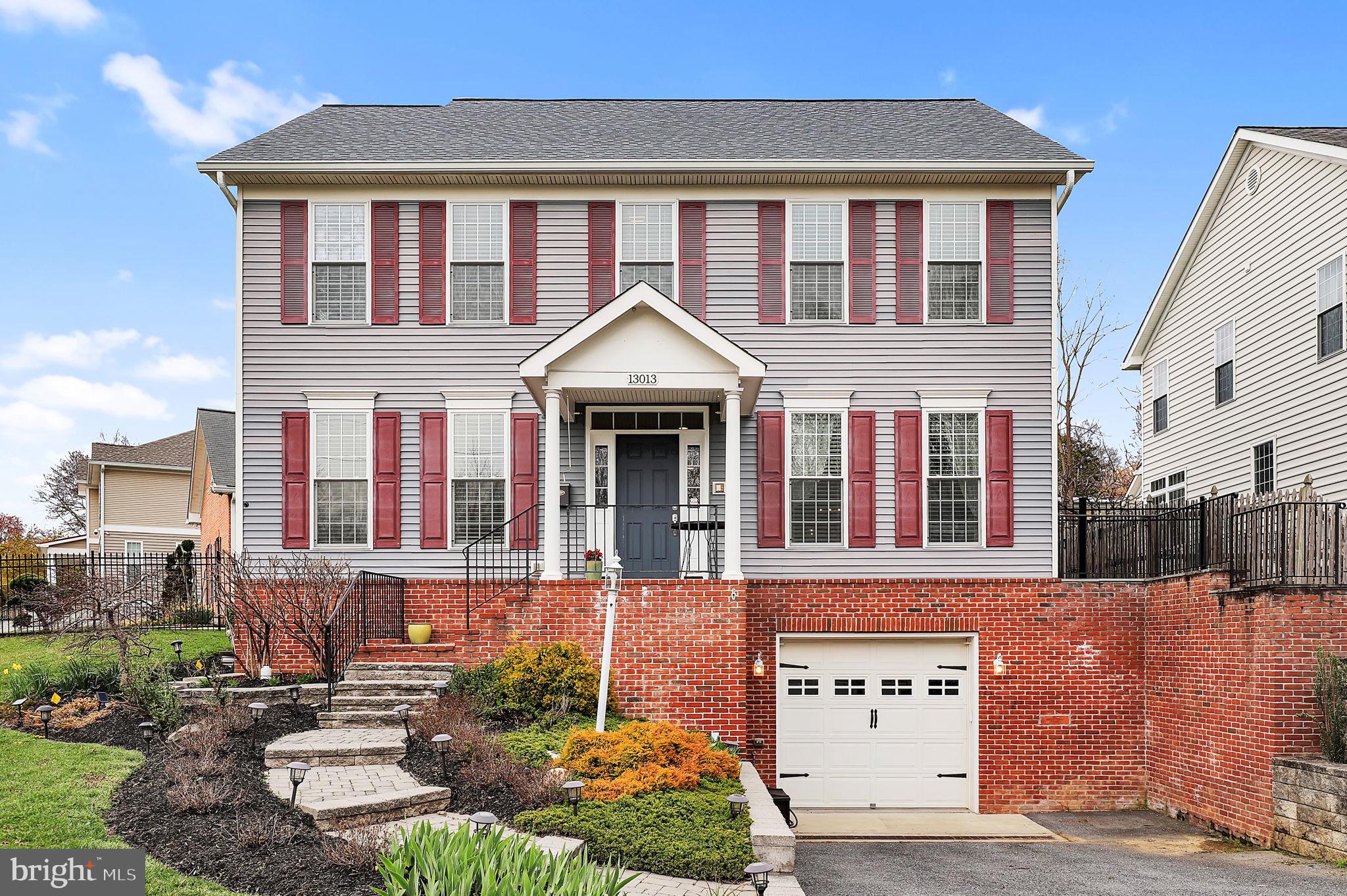 Welcome to 13013 Connecticut Avenue, a beautifully maintained and thoughtfully designed Colonial home in Silver Spring’s desirable 20906 zip code. Nestled just moments from the scenic Matthew Henson State Park trails and the vibrant Aspen Hill Shopping Center, this picture-perfect residence offers the perfect blend of nature, convenience, and comfort.

Built less than 10 years ago with today’s modern lifestyle in mind, this 4-bedroom, 3.5-bathroom home boasts an open and airy floor plan filled with natural light from expansive windows throughout. The main level features high ceilings and gleaming hardwood floors, a spacious living room with a cozy fireplace, and a gourmet eat-in kitchen outfitted with timeless white cabinetry, granite countertops, and a large center island. The kitchen flows seamlessly into a separate dining room that opens onto a new flagstone patio (2023)—perfect for indoor-outdoor living and entertaining.

Upstairs, the oversized primary suite offers a peaceful retreat with soaring ceilings, ample closet space, and a spa-inspired en-suite bath featuring a soaking tub and walk-in shower. Two additional large bedrooms share a second full bath, and a convenient second-floor laundry room makes daily routines effortless.

The fully finished lower level adds versatile space with a full bathroom—ideal for a home office, gym, playroom, or guest suite. Enjoy added privacy with a fully fenced yard and stunning professional landscaping in the front yard.

Recent Updates & Features: Bosch French door refrigerator (2022), Updated lighting fixtures throughout, Fresh paint on the main floor, basement, and most of the upper level, New flagstone patio built in 2023. 

This home is located in a Convenient Location.  Within walking distance to grocery stores, coffee shops, and retail at Aspen Hill Shopping Center.  Adjacent to miles of scenic trails from Matthew Henson State Park connecting to Rock Creek Park, minutes to I-200 and I-495 and just 2 miles to Glenmont Metro. 

This is more than just a home—it's a lifestyle. Don’t miss your opportunity to own this exceptional Colonial gem in the heart of Silver Spring.
