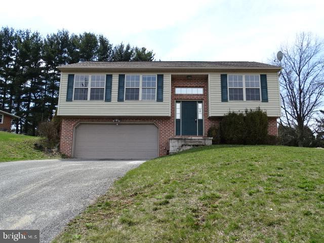 Split-foyer style home with panoramic views overlooking Manchester. This property is also located on a dead end street. Property features cathedral ceilings in the Living Room, Dining area and Kitchen. Sliders off the dining room to your back deck and private back yard. Galley style oak kitchen. Three bedrooms, 2 1/2 baths, with a laundry / utility room, lower level family room with a  half bath, large over-sized 2 car garage.  This property needs many cosmetics and updates.  Great way to build instant equity. Property is being sold in AS IS condition. Seller will make no repairs.