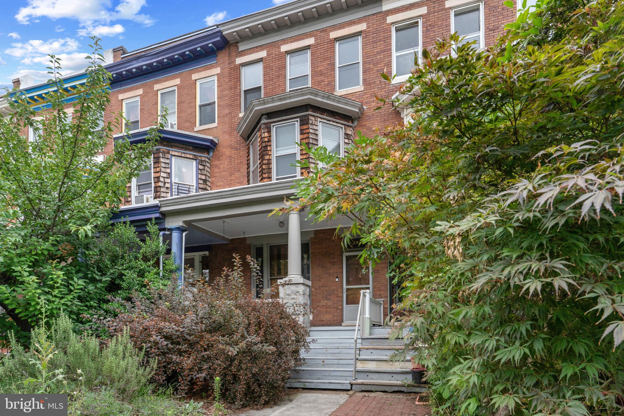 2922 Guilford Road is a well-maintained, five-bedroom historic home located in Baltimore's Charles Village neighborhood. The interior features historic hardwood flooring and fresh paint throughout. The main level includes a formal living space and a convenient powder room. On the second floor, there are three bedrooms and an updated full bathroom, while the third floor provides two additional large bedrooms, offering a flexible layout for residents, guests, or a home office.
The property is equipped with modern mechanical systems, including central air conditioning and a high-end boiler system for heating. A large, unfinished basement provides extensive storage space.
The exterior features a brand-new rear deck that overlooks a sizeable backyard positioned between the house and a detached rear-entry garage. This outdoor space provides functional area for dining and recreation, while the garage offers secure parking and additional storage. The property is situated in a prime location, with convenient access to Johns Hopkins University, local dining, and neighborhood amenities.