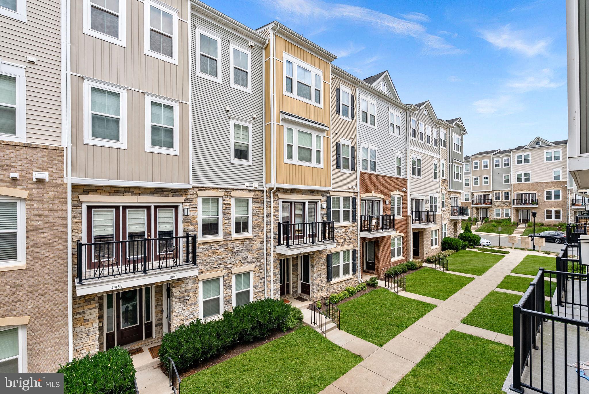 Move-In Ready Stone Ridge Townhome Condo with Contemporary Finishes & Flexible Living Space! Welcome to this beautifully updated townhome-style condo in the highly sought-after Stone Ridge community. Featuring a modern design aesthetic, and flexible living spaces throughout, this home offers the perfect blend of style, comfort, and functionality. The entry level features a versatile flex space ideal for a home office, gym, or playroom, along with storage, a mudroom area, and access to the 1-car garage and driveway. The main living level showcases a bright, open-concept layout. The kitchen is appointed with sleek cabinetry, white quartz countertops, contemporary finishes, and a spacious walk-in pantry, while the living area opens to a private deck, perfect for entertaining. Enjoy a private primary suite level complete with a large walk-in closet and a spa-inspired bathroom featuring dual vanities, a soaking tub, and a walk-in shower. Laundry is conveniently located on the same floor. The top level offers two additional spacious bedrooms, a full bathroom, and extra storage—ideal for guests, family, or work-from-home needs. This move-in ready home is located in the amenity-rich Stone Ridge community with pools, playgrounds, walking trails, and more, all just minutes from shopping, dining, and major commuter routes.