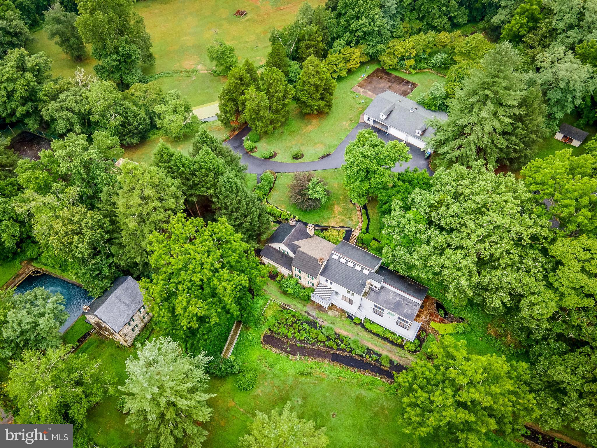 SELLER PREQUIRES PREAPPROVAL LETTER OR PROOF OF FUNDS PRIOR TO SCHEDULING A SHOWING.
***45 acre estate that harmoniously melds Maryland's rich history with modern luxury along the tranquil banks of Broad Creek. This property is a historical gem with a plethora of features that cater to both comfort and style. 
**Recent Improvements:
2024 – New electric service line to lower garage. Entire interior of house painted. New basement carpets. Basement refinished and updated.  Primary bathroom renovated. 14 Window/Door glass replacement.  Deck refinished.  New water heater for main house.
2023 – Wood pellet stove installed.  Water treatment installed.  Barn painted.
2022 – New HVAC system in Great Room. New roof on center section of main house. Replaced 4’ of slate roof and all snow guards.  Replaced all water hydrants throughout property.  New circuit breaker box installed at tennis court.  Woodburning stove insert installed.
2021-2023 – Cottage COMPLETELY GUTTED to studs and completely renovated. New 1st floor joists/mud sill, all new insulation, 200 AMP service, all new electric, plumbing, roof, gutters, siding, windows, doors HVAC, appliances, hardwood floors, gas fireplace, propane tank (owned).
2021 – Septic system repair/upgrade:  2 new septic tanks; 1 new pump chamber and force main.  New service line to cottage.  Bathrooms upgraded and all new toilets.
2020 -  Driveway replace.
Property Features:
**Historic Charm Meets Modern Luxury**: Step inside the main residence where classic millwork and hardwood floors create an inviting atmosphere. With six fireplaces dotting the space, this home seamlessly integrates historic elegance with a contemporary family area. The sunlit Great Room offers breathtaking views, perfect for both relaxation and entertainment.
**Chef's Kitchen**: Culinary enthusiasts will appreciate the chef's kitchen, which balances old-world charm with state-of-the-art amenities. It beautifully centers around a preserved 1743 structure, blending tradition with modern functionality.
 **Rustic Appeal**: A restored mill adds a unique rustic touch, while a renovated guest cottage provides a cozy retreat for visitors or potential rental income.
 **Expansive Outdoor Amenities**: Enjoy luxurious outdoor living with a tennis court, stable barn, and a 12-car garage surrounded by lush woodlands. A serene pond on the property can be transformed into a sparkling swimming pool, perfect for summer gatherings.
 **Grounds and Landscaping**: The enchanting landscaping enhances the property's natural beauty, while every detail, from the re-pointed mill to the meticulously maintained gardens, speaks to the estate's storied past.
Historical Significance:
- This estate is recognized on the **National Historic Registry** and the **Maryland Register of Historic Places**, emphasizing its cultural importance.
- It is a designated site on the **National Underground Railroad Network to Freedom**, being the birthplace of Margaret Morgan and the only privately held site in Harford County related to this historic movement.
- While the property holds significant historical value, it is not on the **Harford County Register of Historic Places**, allowing for flexibility in renovations without needing approval, though owners may seek this designation for access to tax breaks and grants for preservation efforts.
 Additional Information:
 **Conservation Easement**: Detailed information regarding conservation easement, Maryland Environmental Trust involvement, tax benefits, and a comprehensive forest management plan is available for interested buyers.
**Hunting Lease**: The property currently has a lease agreement with the Chesapeake Area Bowhunters, which can be terminated if desired or transferred to the new owners with a possible prorated reimbursement.
 **Well Inspection**: A well inspection was completed to document the well on record with Harford County, following renovations of the cottage between 2021-2023.
